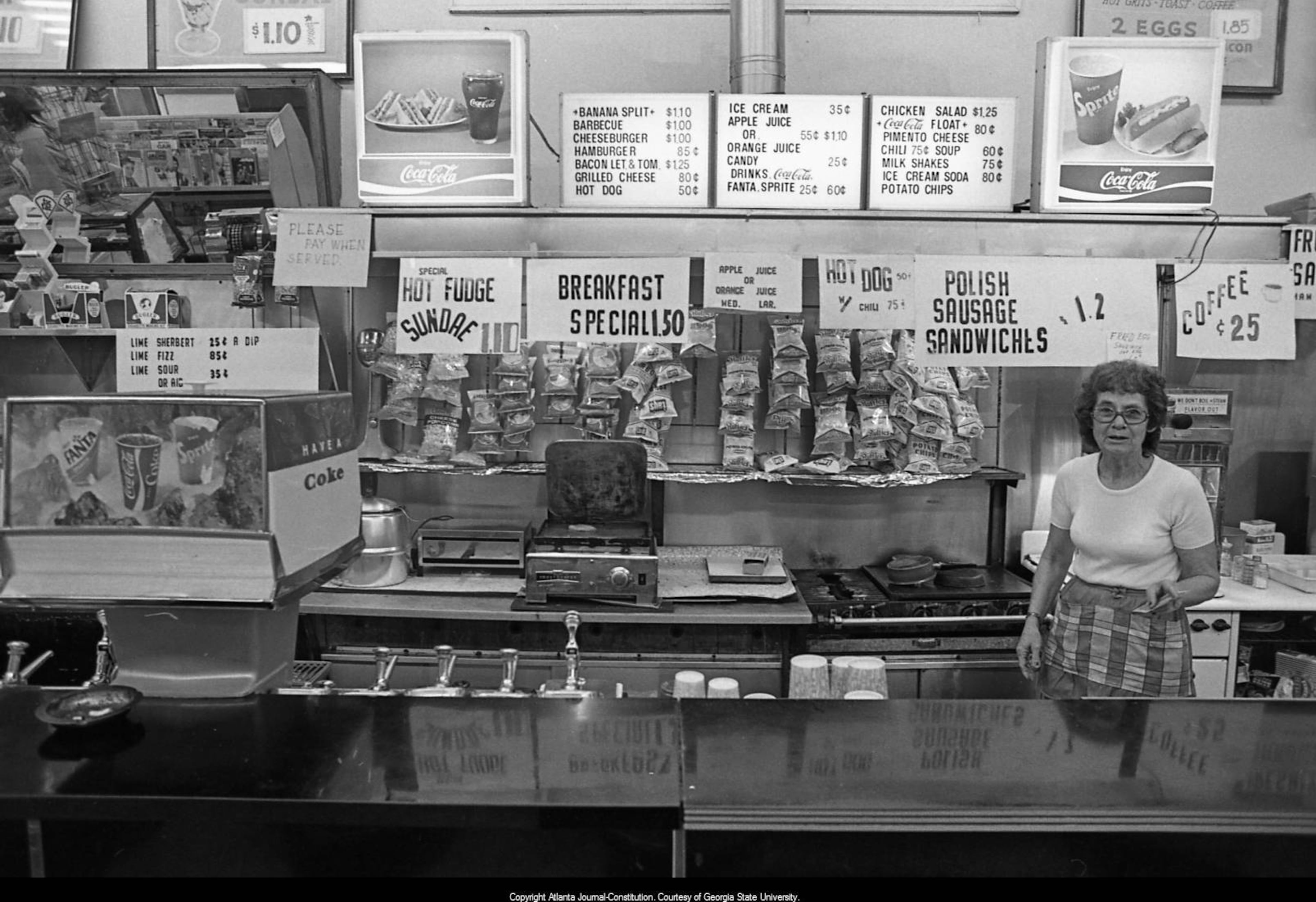 Sept. 19, 1980 -- Small businesses have traditionally been the lifeblood of Little Five Points, as was the case with Euclid Drugs, which operated an old-fashioned lunch counter and soda fountain inside its pharmacy.