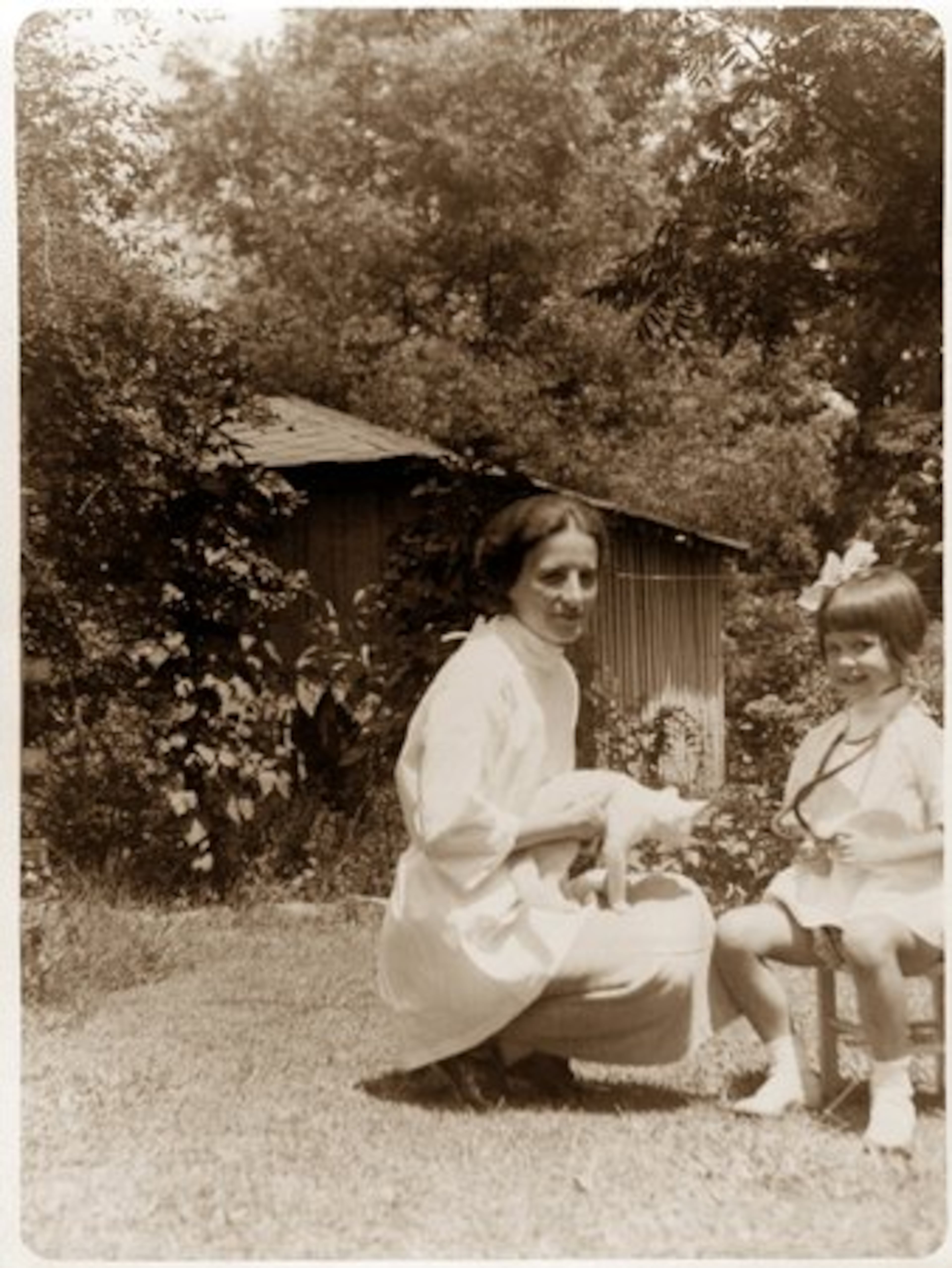 Leila Denmark played doctor with Tutsy the cat and mother Mary Denmark (right) sometime in 1035 or 1936.