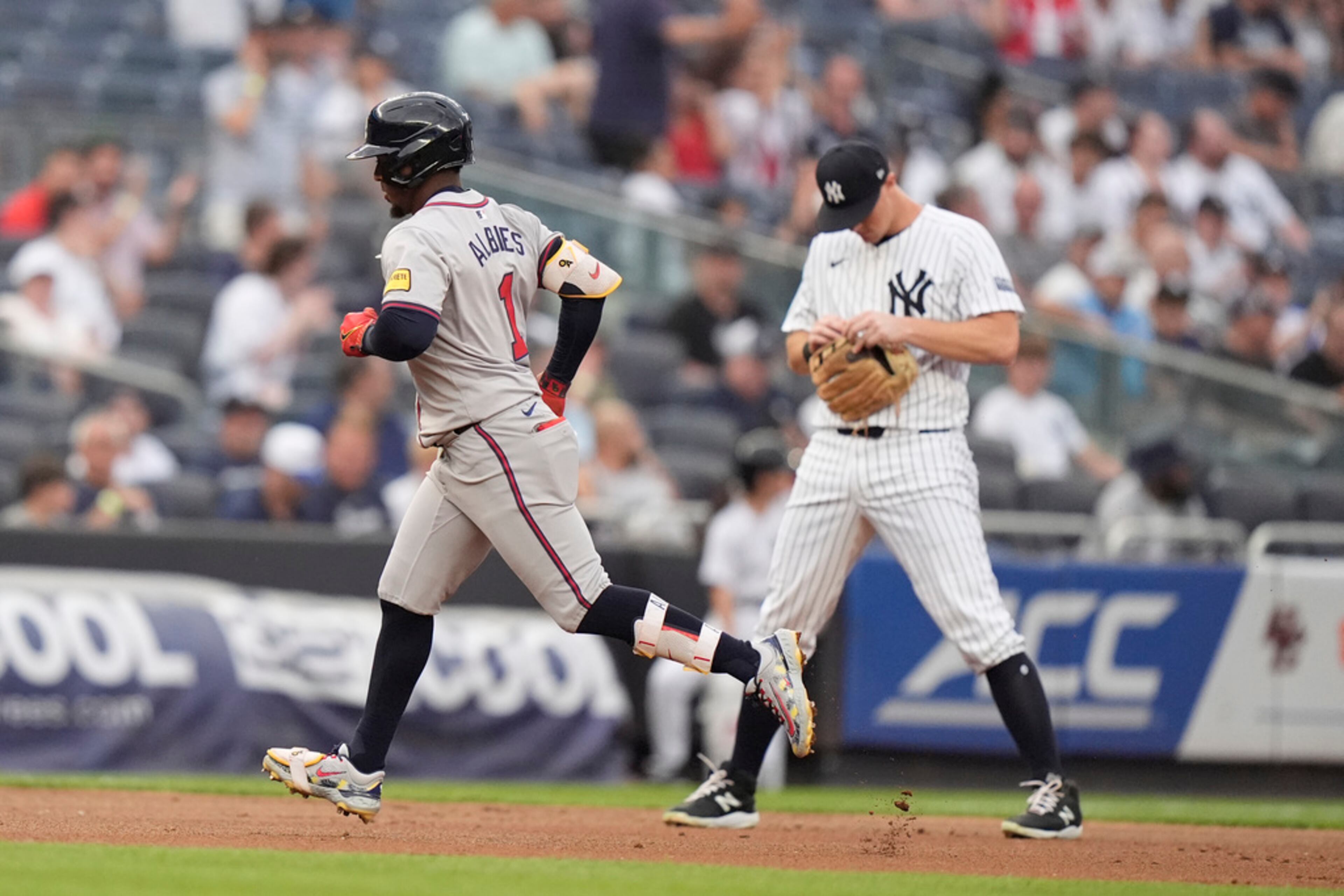Atlanta Braves' Ozzie Albies (1) runs the bases after hitting a two-run home run against the New York Yankees during the first inning of a baseball game Friday, June 21, 2024, in New York. (AP Photo/Frank Franklin II)