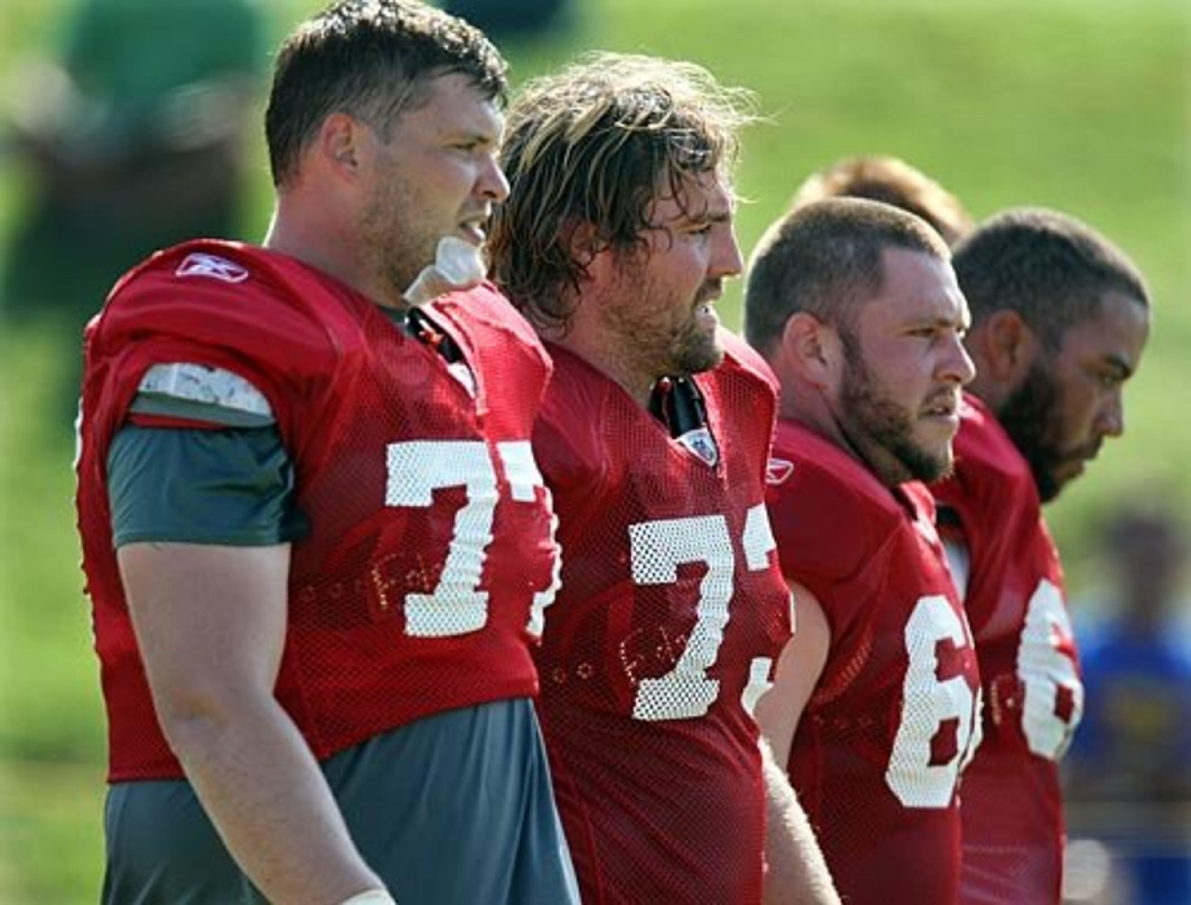 Offensive linemen Tyson Clabo, Harvey Dahl, Todd McClure and Justin Blalock (from left to right) approach the line of scrimmage.