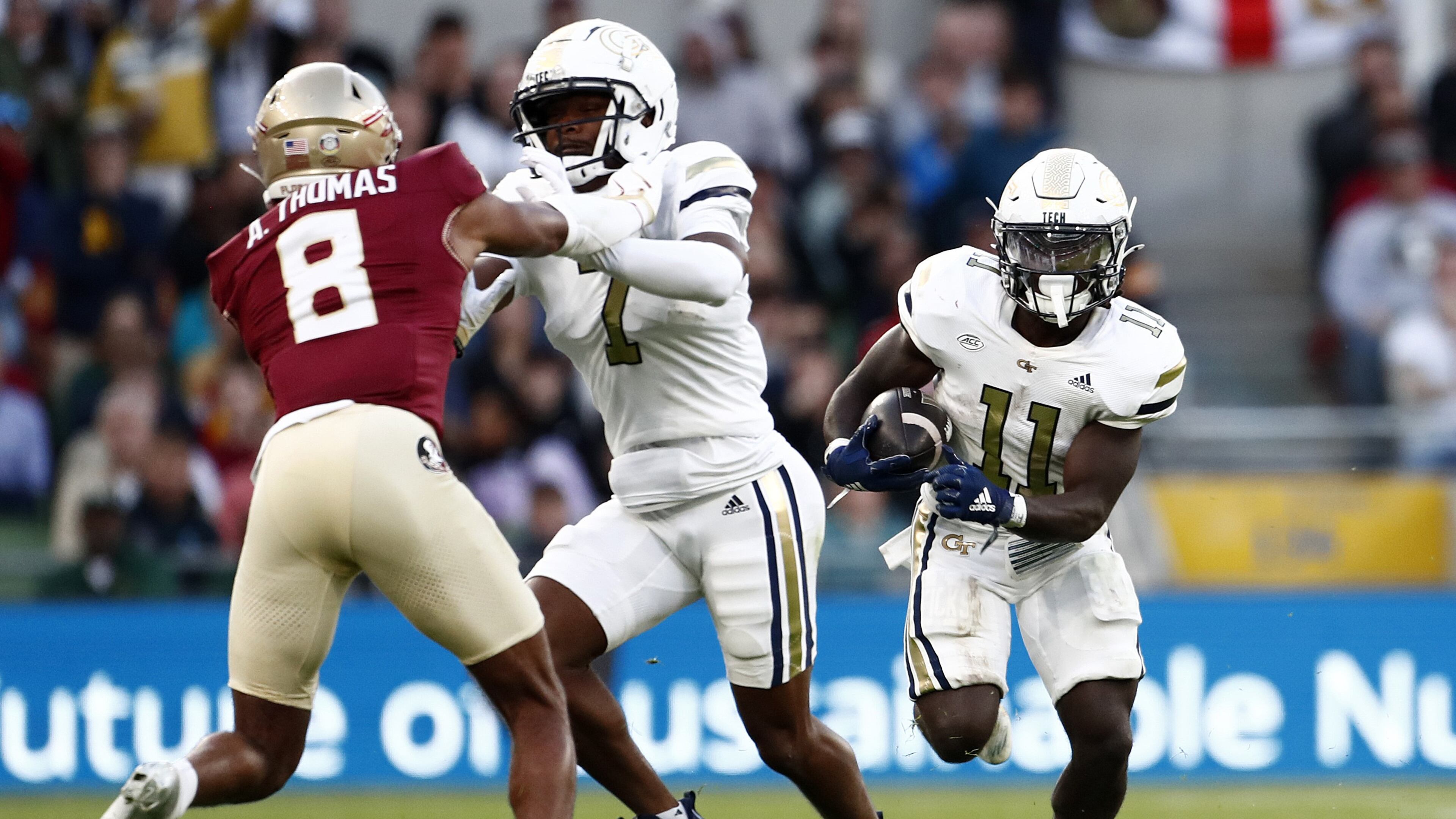 Jamal Haynes (11) scored two touchdowns as Georgia Tech rushed for 190 yards in its 24-21 victory over Florida State.
