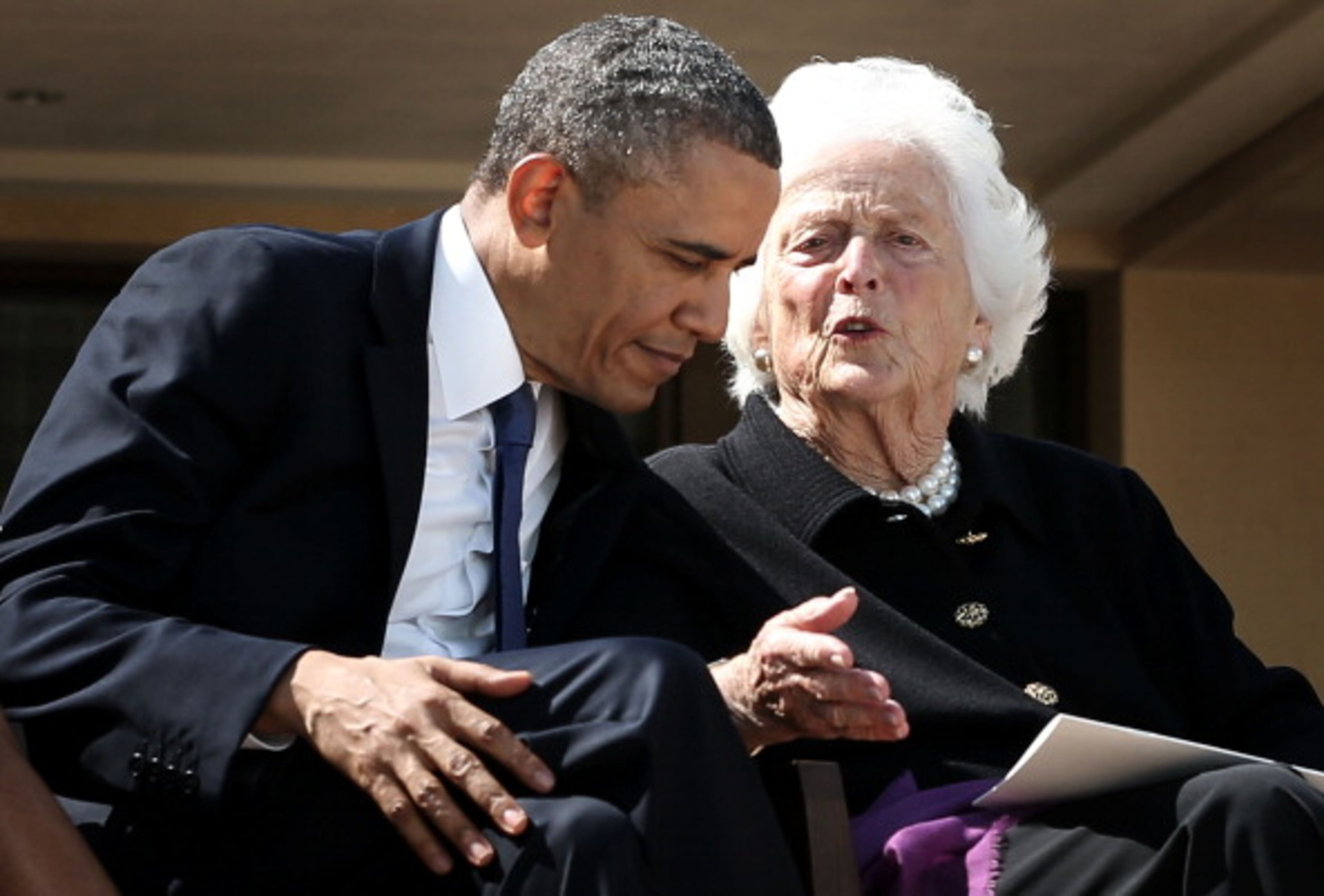 DALLAS, TX - APRIL 25: U.S. President Barack Obama (L) listens to former first lady Barbara Bush (R) during the opening ceremony of the George W. Bush Presidential Center April 25, 2013 in Dallas, Texas. The Bush library, which is located on the campus of Southern Methodist University, with more than 70 million pages of paper records, 43,000 artifacts, 200 million emails and four million digital photographs, will be opened to the public on May 1, 2013. The library is the 13th presidential library in the National Archives and Records Administration system. (Photo by Alex Wong/Getty Images)