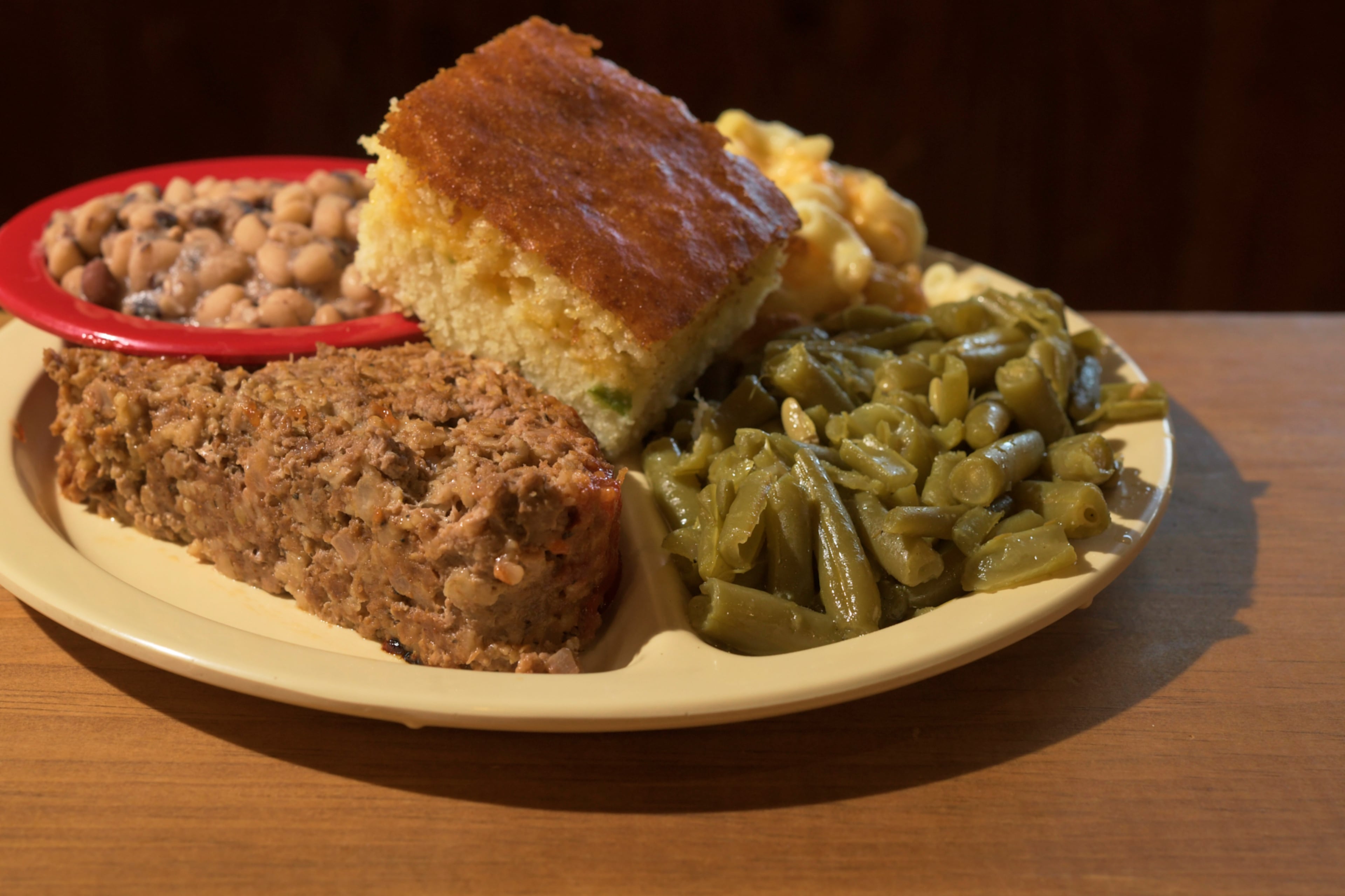 One of the many "Meat and Three" plates at eh Cottage House Restaurant. This particular plte consist of meatloaf, black eyed peas, cornbread, green beans and mac and cheese.
Photo taken on Tuesday October 8th, 2024 by Greg Rannells for The Atlanta Journal Constitution.
Slug: AAJC 120824 dg diners intro.
