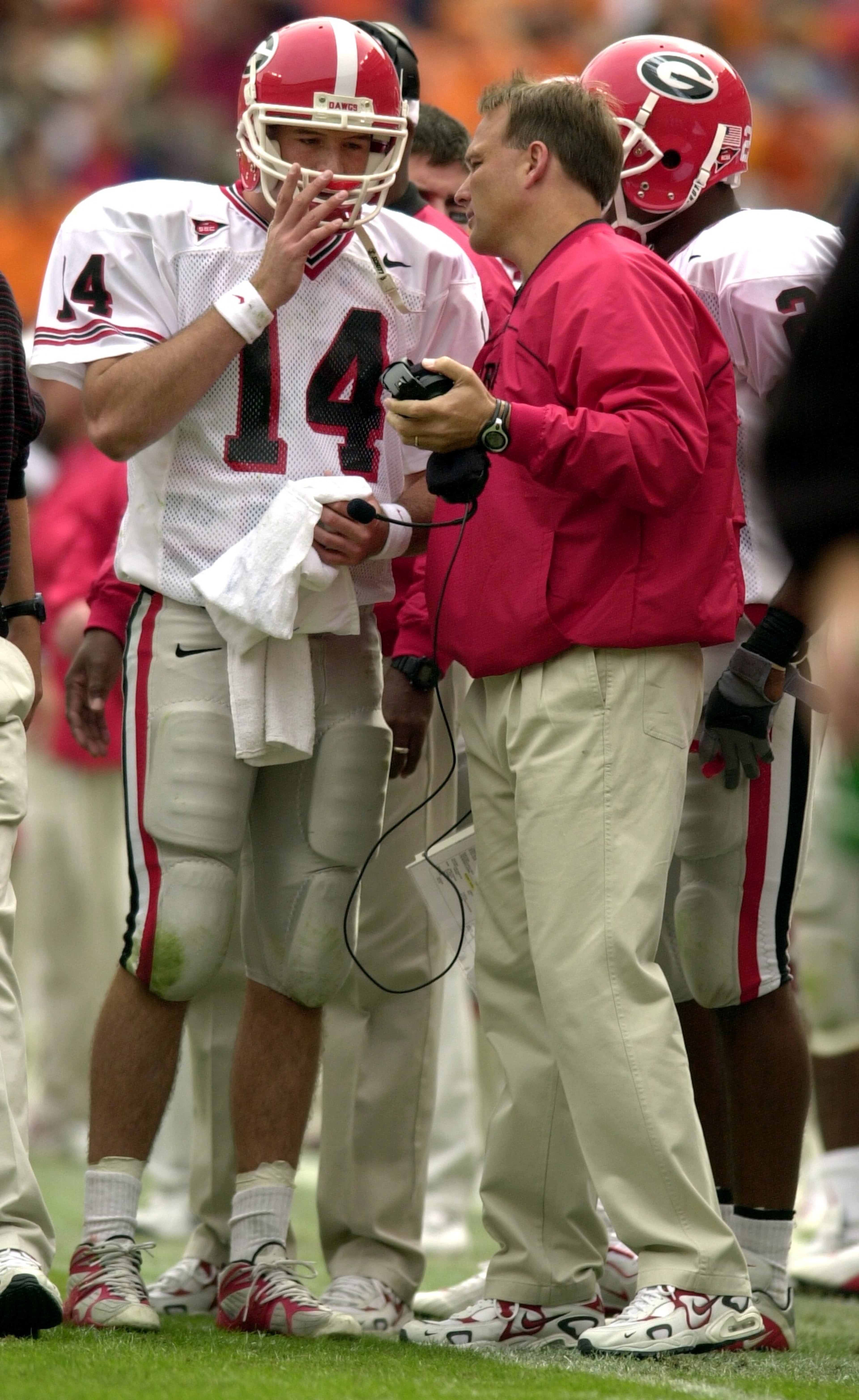 Richt confers with Greene late in the 2001 game against Tennessee ....