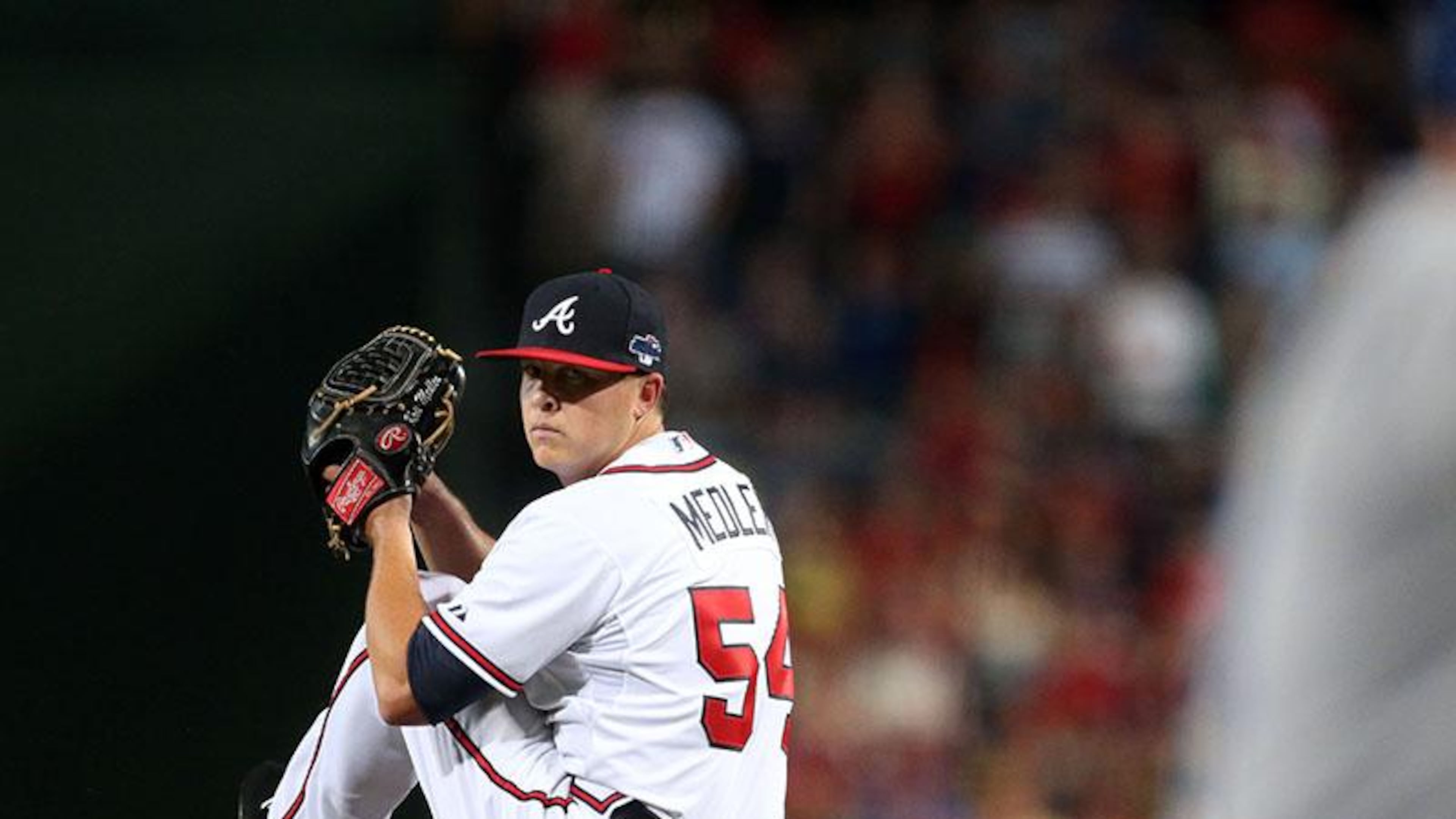 Kris Medlen is working his way up the Braves’ minor league system as he attempts his comeback from shoulder injuries that sidelined him for much of last season with the Royals. He had two Tommy John elbow surgeries during his years with the Braves through 2014. (AJC file photo)