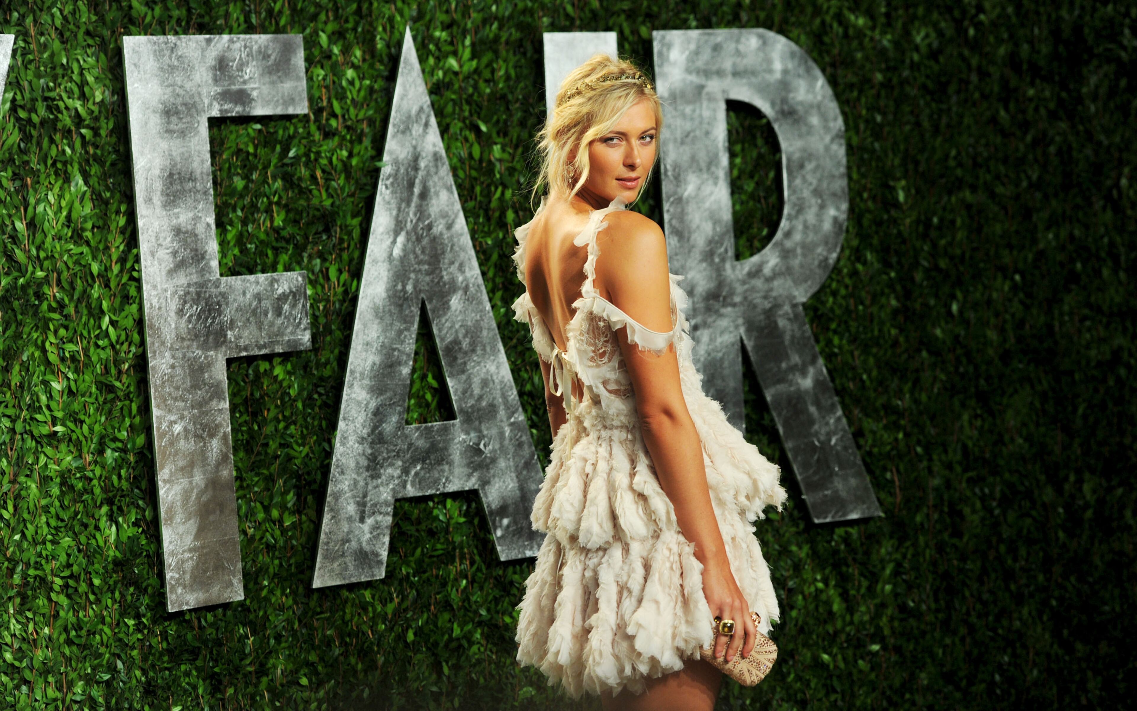 Tennis player Maria Sharapova arrives at the 2012 Vanity Fair Oscar Party hosted by Graydon Carter at Sunset Tower on Feb. 26, 2012, in West Hollywood, Calif.