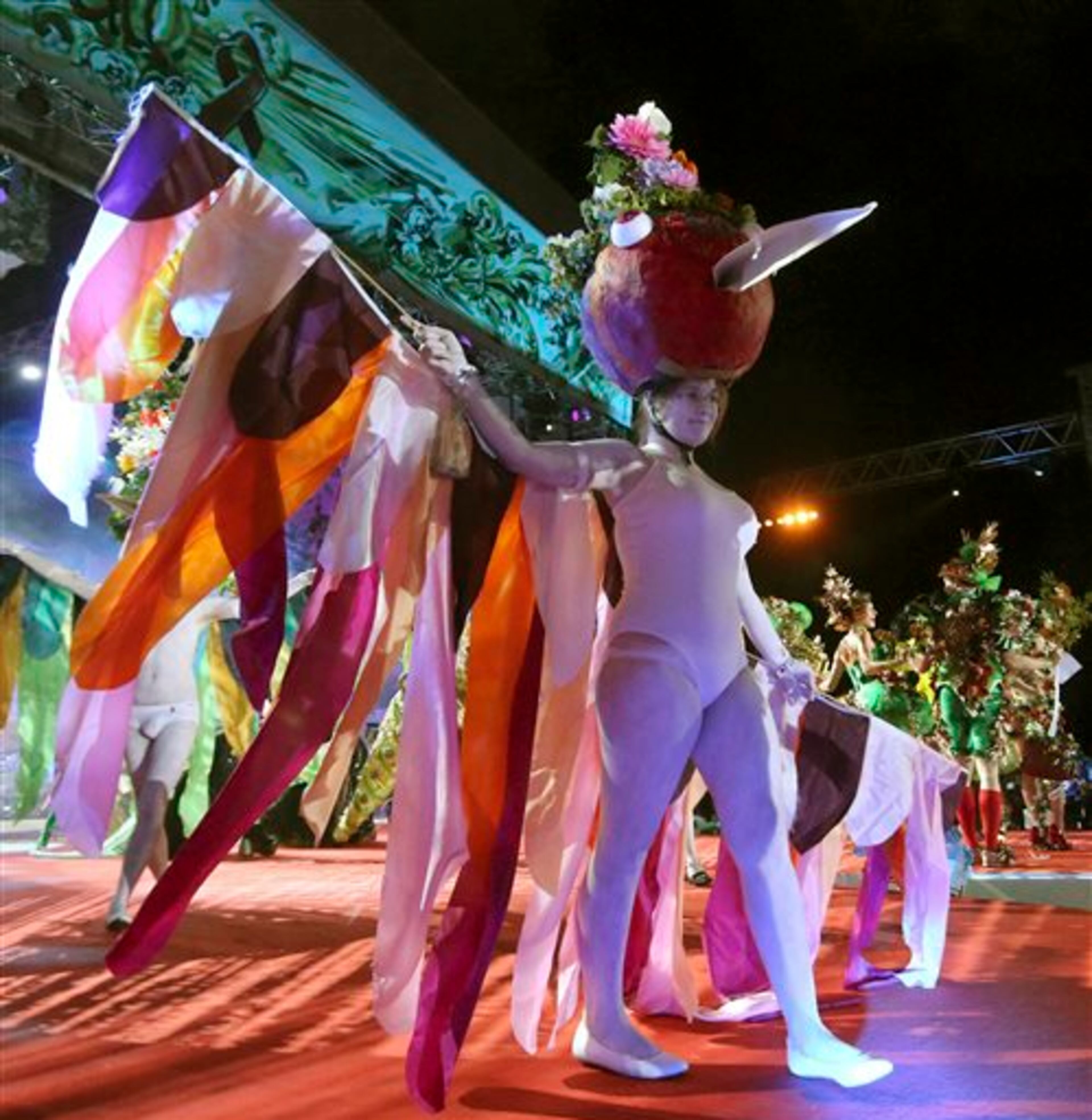 Models performs on stage during the opening ceremony of the Life Ball in front of City Hall in Vienna, Austria, Saturday, May 31, 2014. The Life Ball is a charity gala to raise money for people living with HIV and AIDS. (AP Photo/Ronald Zak)