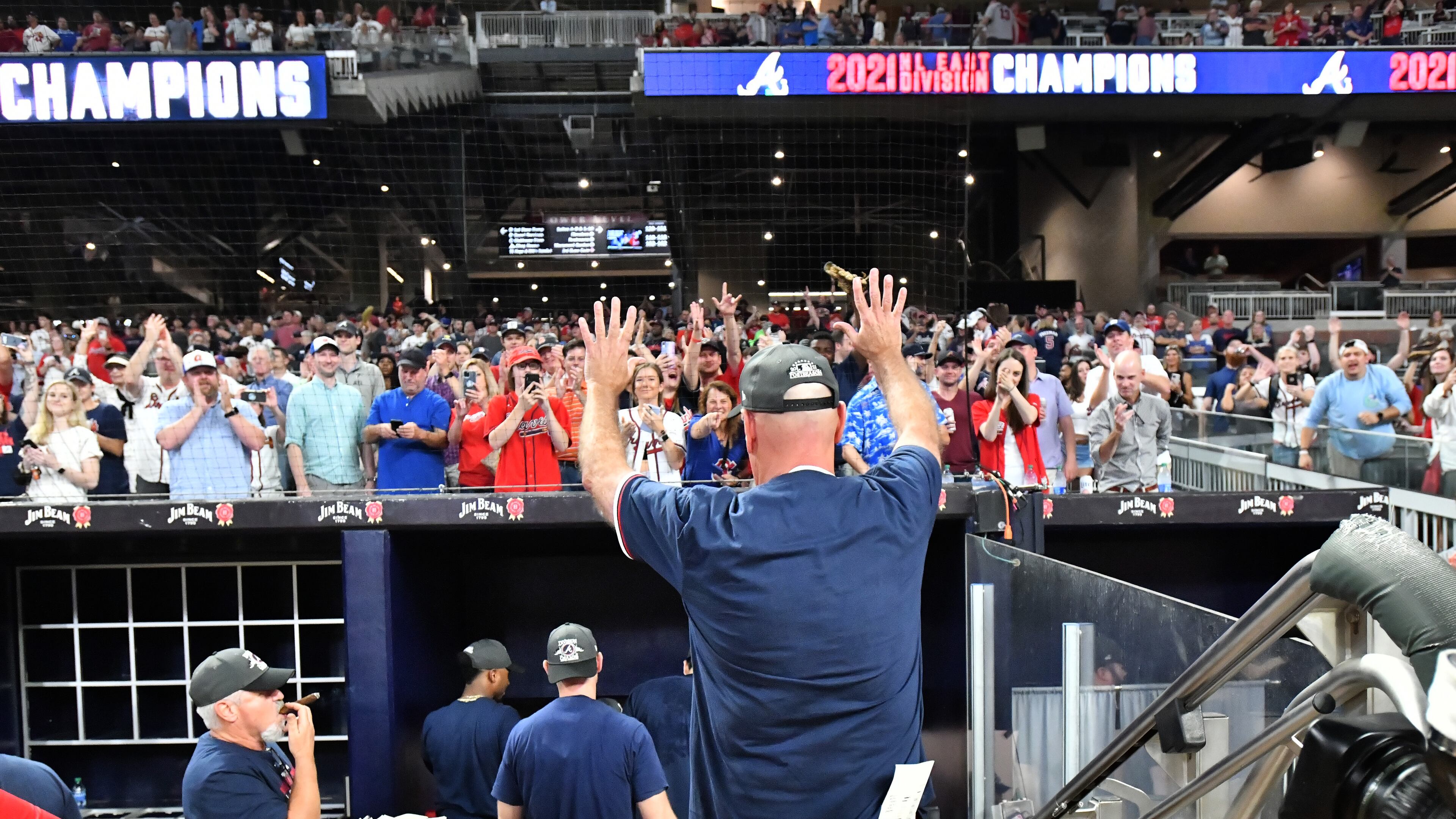 Braves manager Brian Snitker waves to fans after his team won the NL East championship Thursday, Sept. 30, 2021, at Truist Park in Atlanta. (Hyosub Shin / Hyosub.Shin@ajc.com)