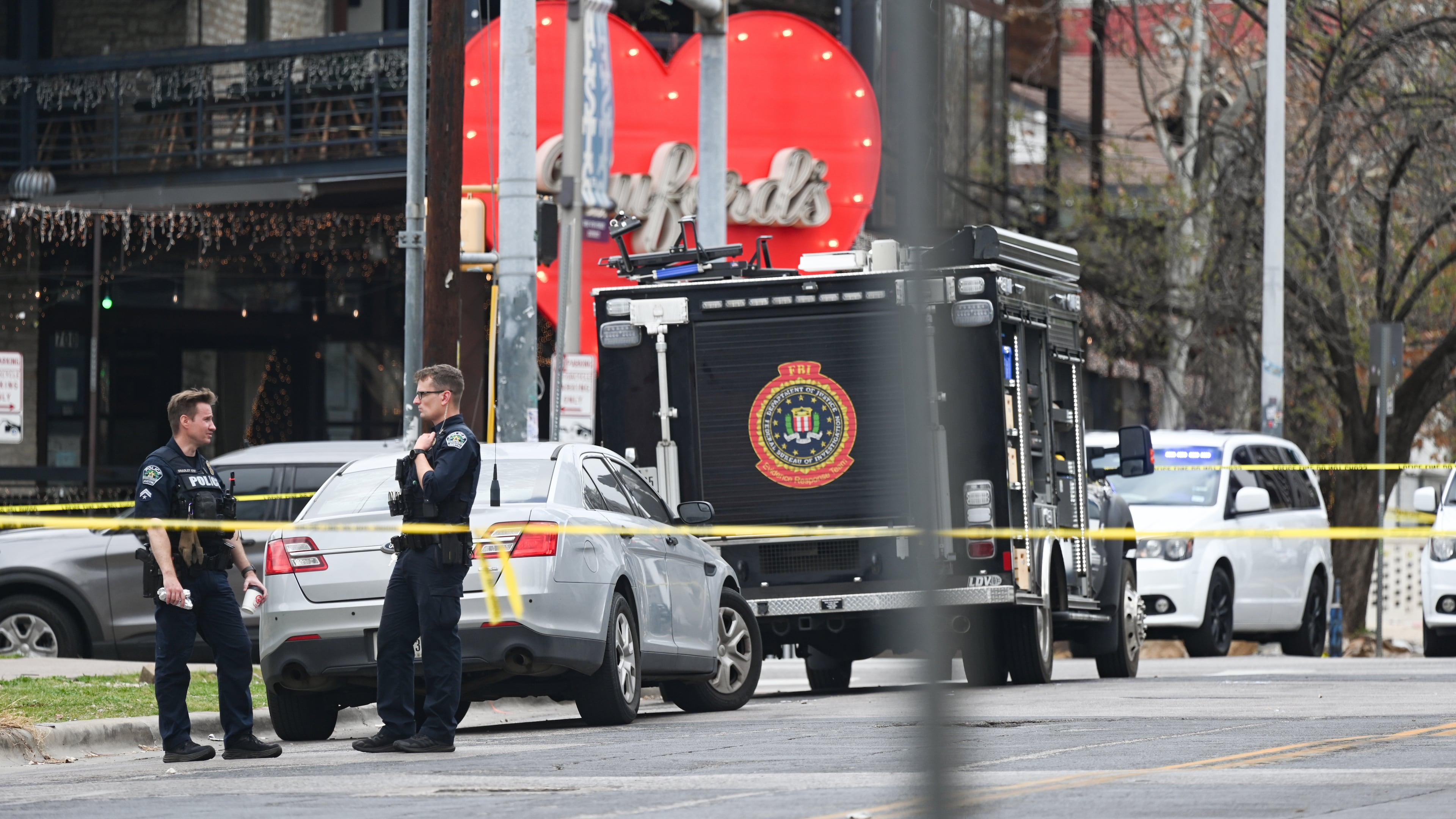 FILE - The Austin Police Department and the FBI investigate a shooting at Buford's on 6th Street on Sunday, March 1, 2026, in Austin, Texas. (AP Photo/Jack Myer, File)