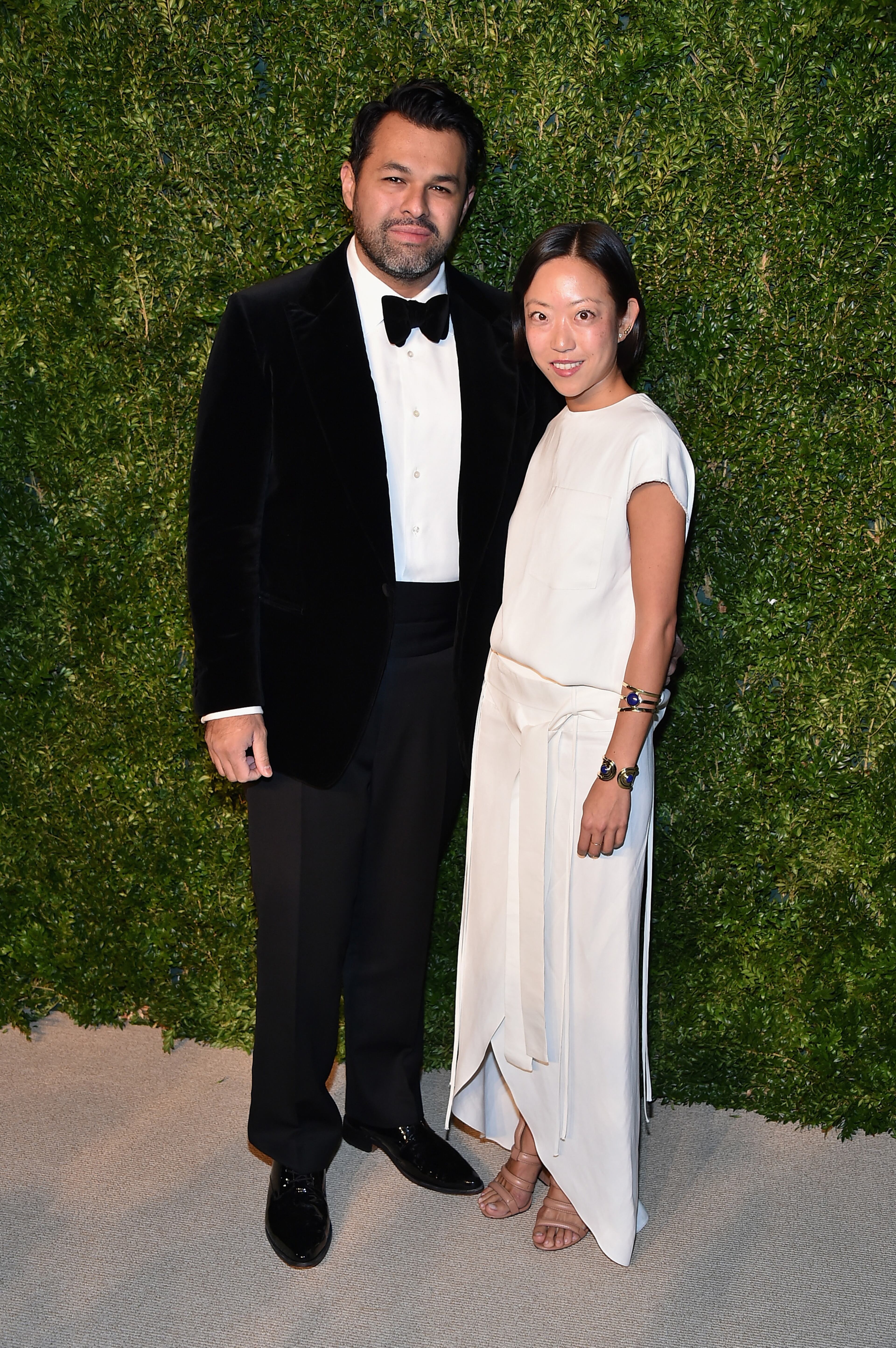 NEW YORK, NY - NOVEMBER 03: Designer Juan Carlos Obando (L) and a guest attend the 11th annual CFDA/Vogue Fashion Fund Awards at Spring Studios on November 3, 2014 in New York City. (Photo by Theo Wargo/Getty Images)