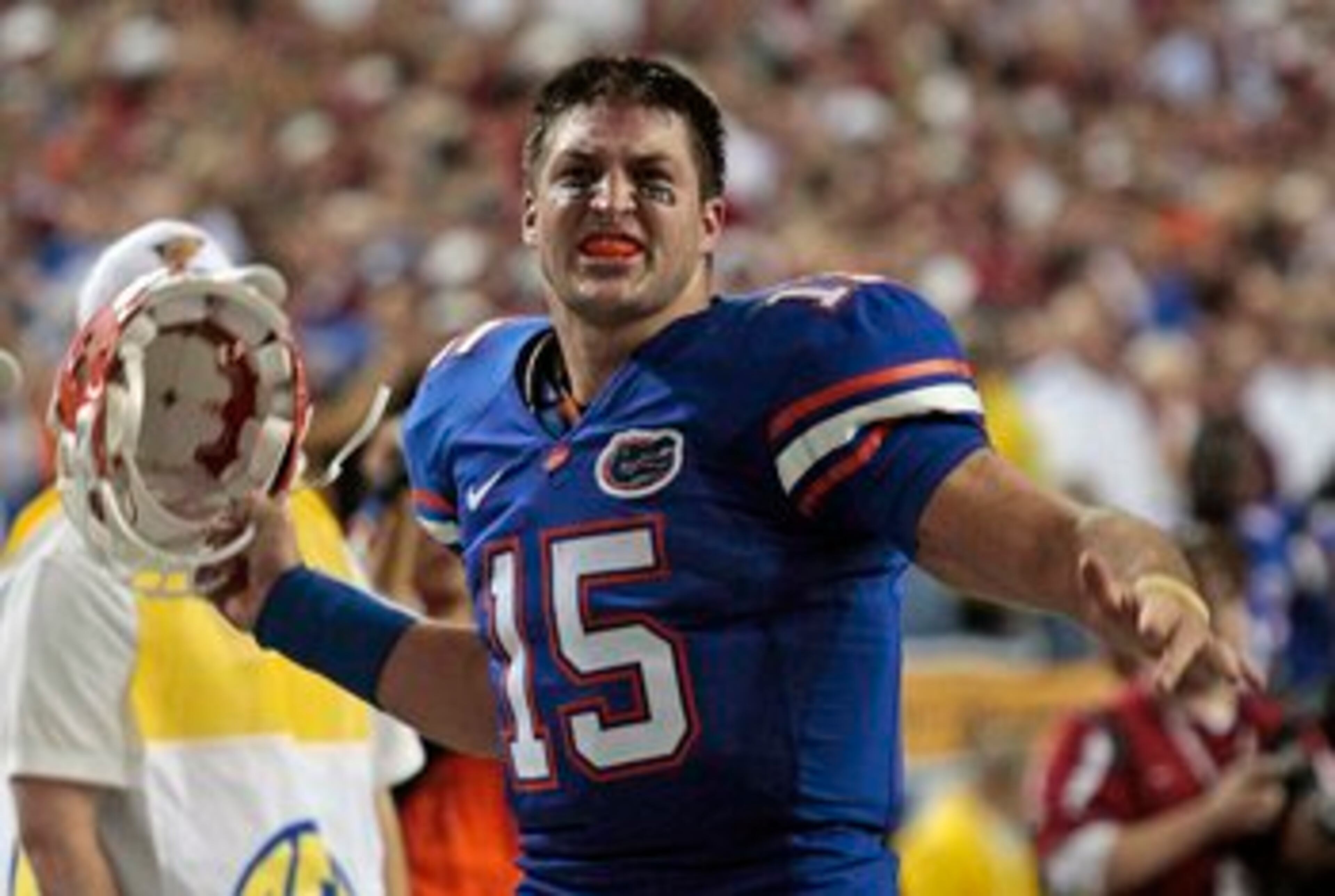 In a battle of Heisman trophy winners, UGA might actually be the favorite in this battle with a Gator. But, at 6-3, 236, Tim Tebow has few pounds and a few inches on the 6-1, 220-pound Walker. But Herschel, 47, owns a big advantage in man strength over the 22-year-old Tebow.