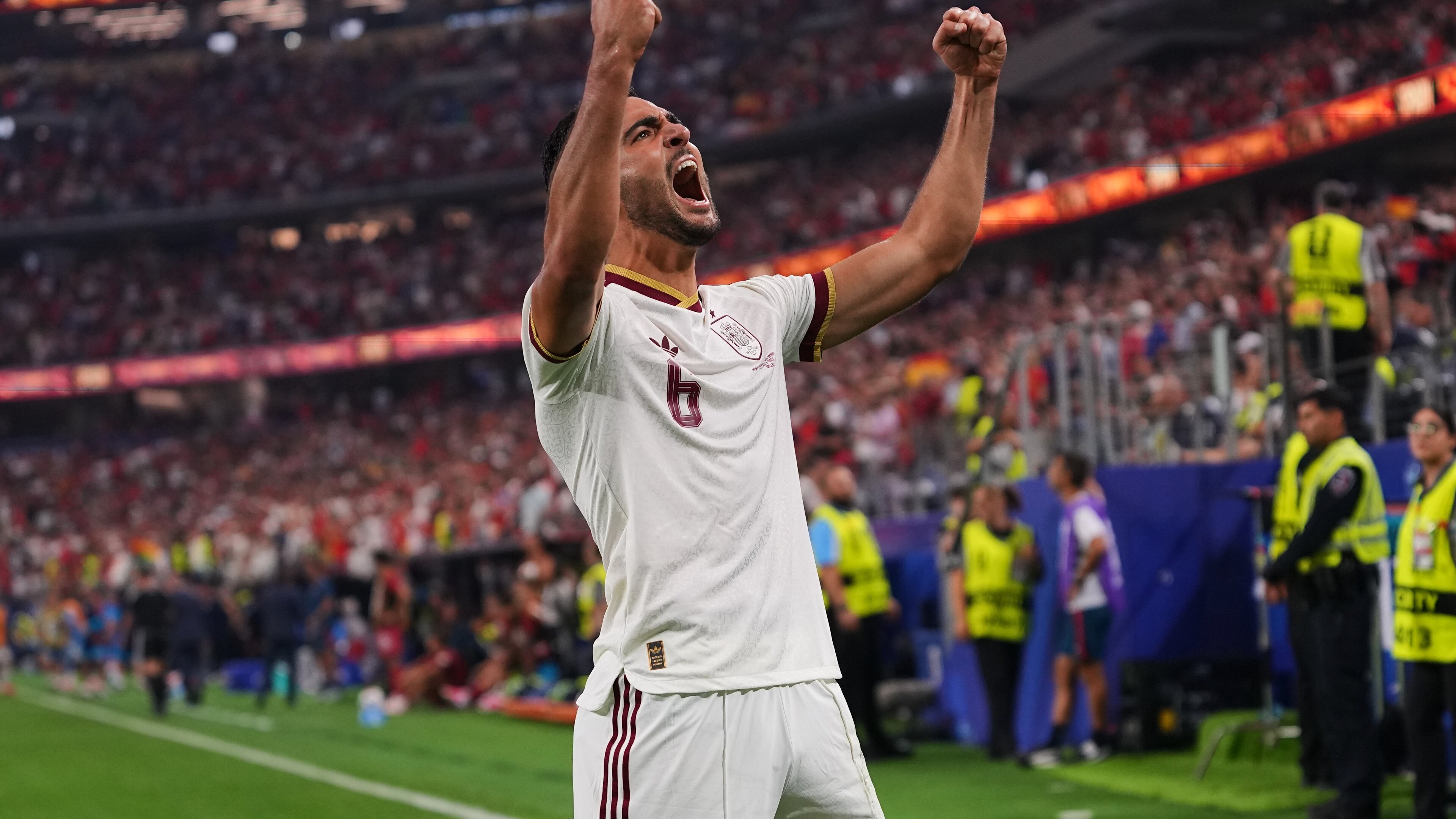 Spain's Mikel Merino (6) celebrates scoring his side's opening goal during the World Cup round of 16 soccer match between Portugal and Spain in Arlington, Texas, near Dallas, Monday, July 6, 2026. (AP Photo/Julio Cortez)