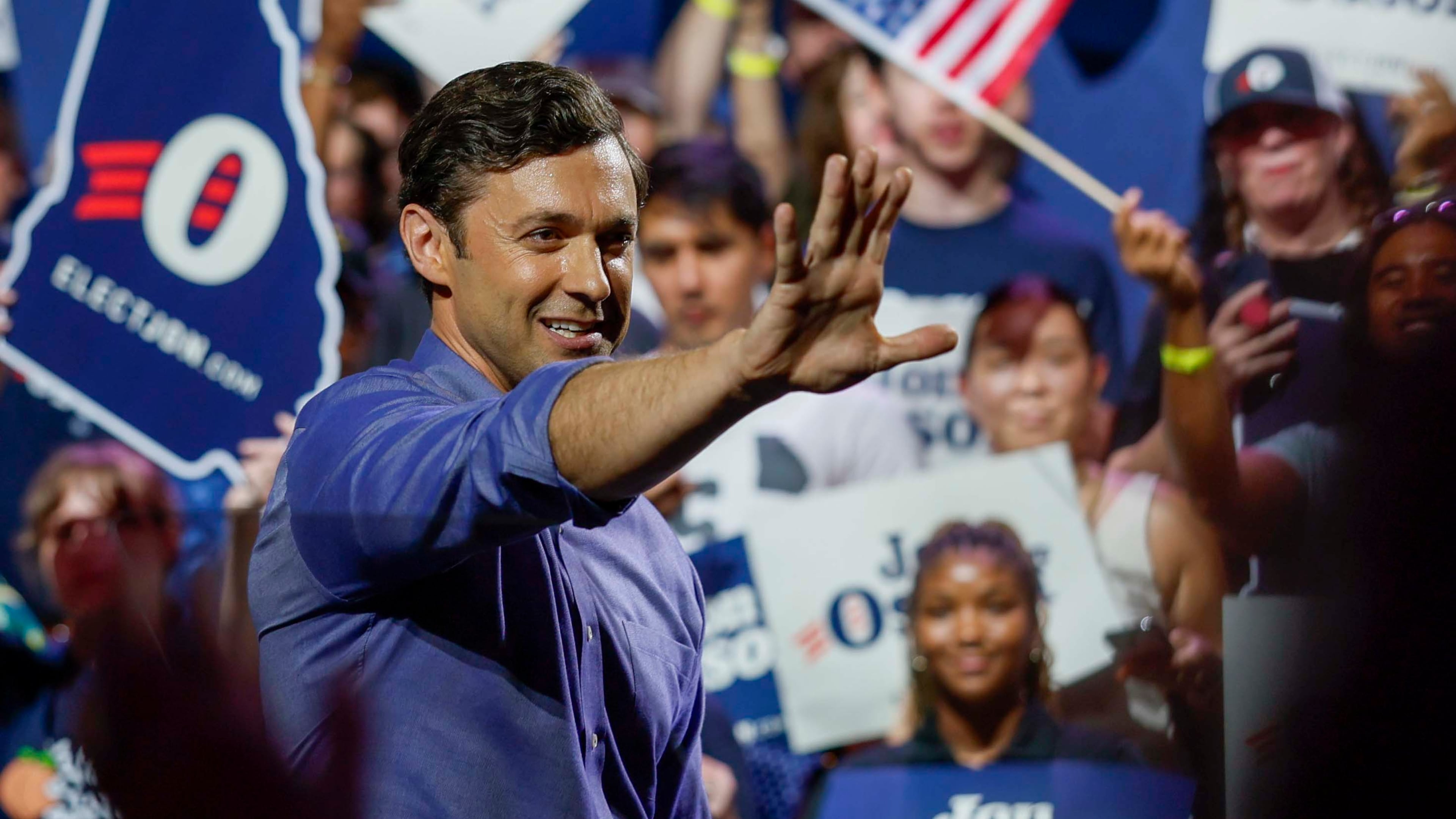 U.S. Sen. Jon Ossoff waves to a supporter after speaking at a campaign rally at the Center Stage Theater earlier this month. (Miguel Martinez/AJC)