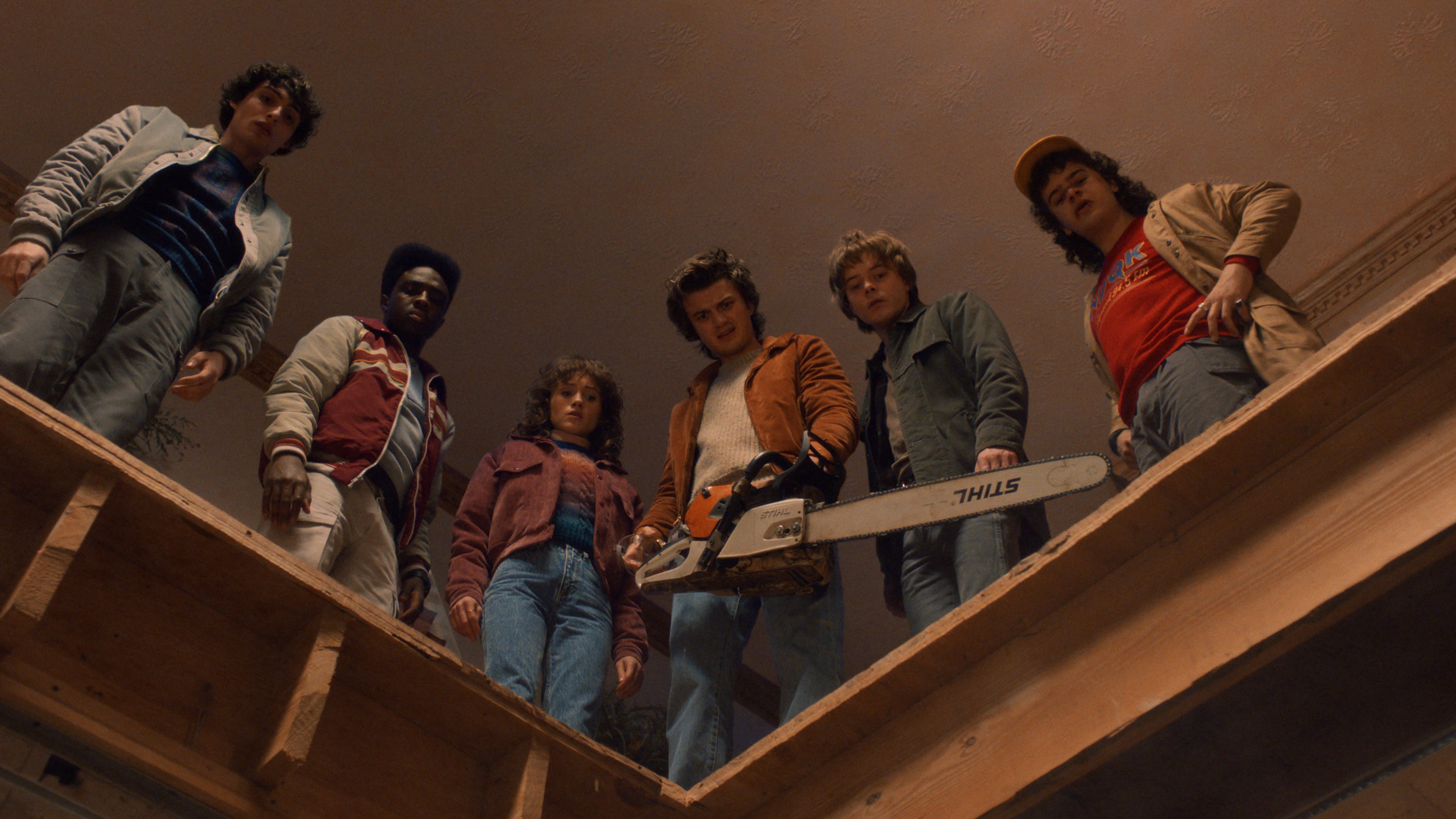 (L to R) Finn Wolfhard as Mike Wheeler, Caleb McLaughlin as Lucas Sinclair, Natalia Dyer as Nancy Wheeler, Joe Keery as Steve Harrington, Charlie Heaton as Jonathan Byers, and Gaten Matarazzo as Dustin Henderson in "Stranger Things: Season 5." (Courtesy of Netflix)