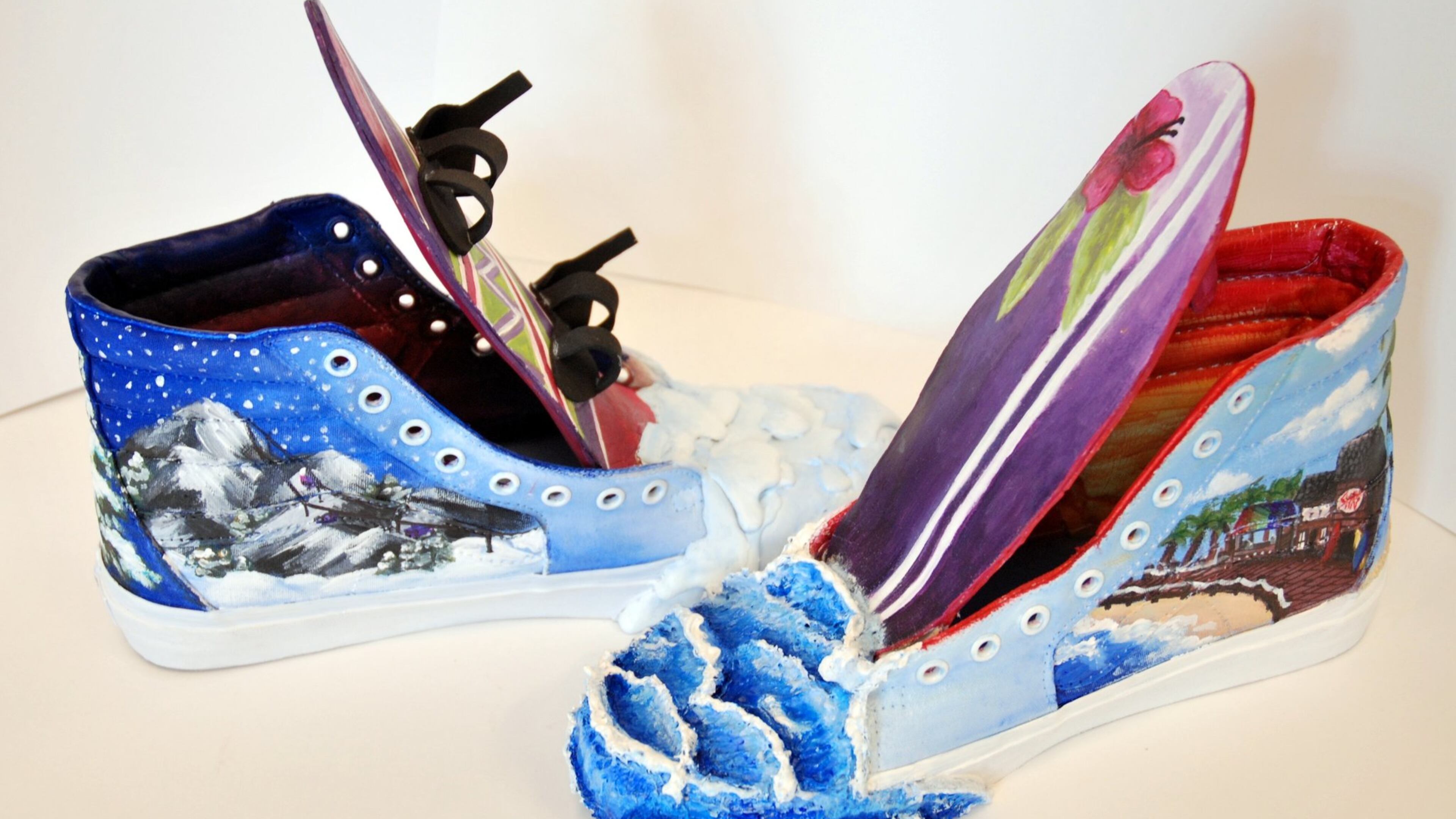 Students at McEachern High School in Powder Springs customized these Vans sneakers, replacing the tongues with a miniature foam snowboard and surfboard, and building up three-dimensional detail on the toes. CONTRIBUTED PHOTO