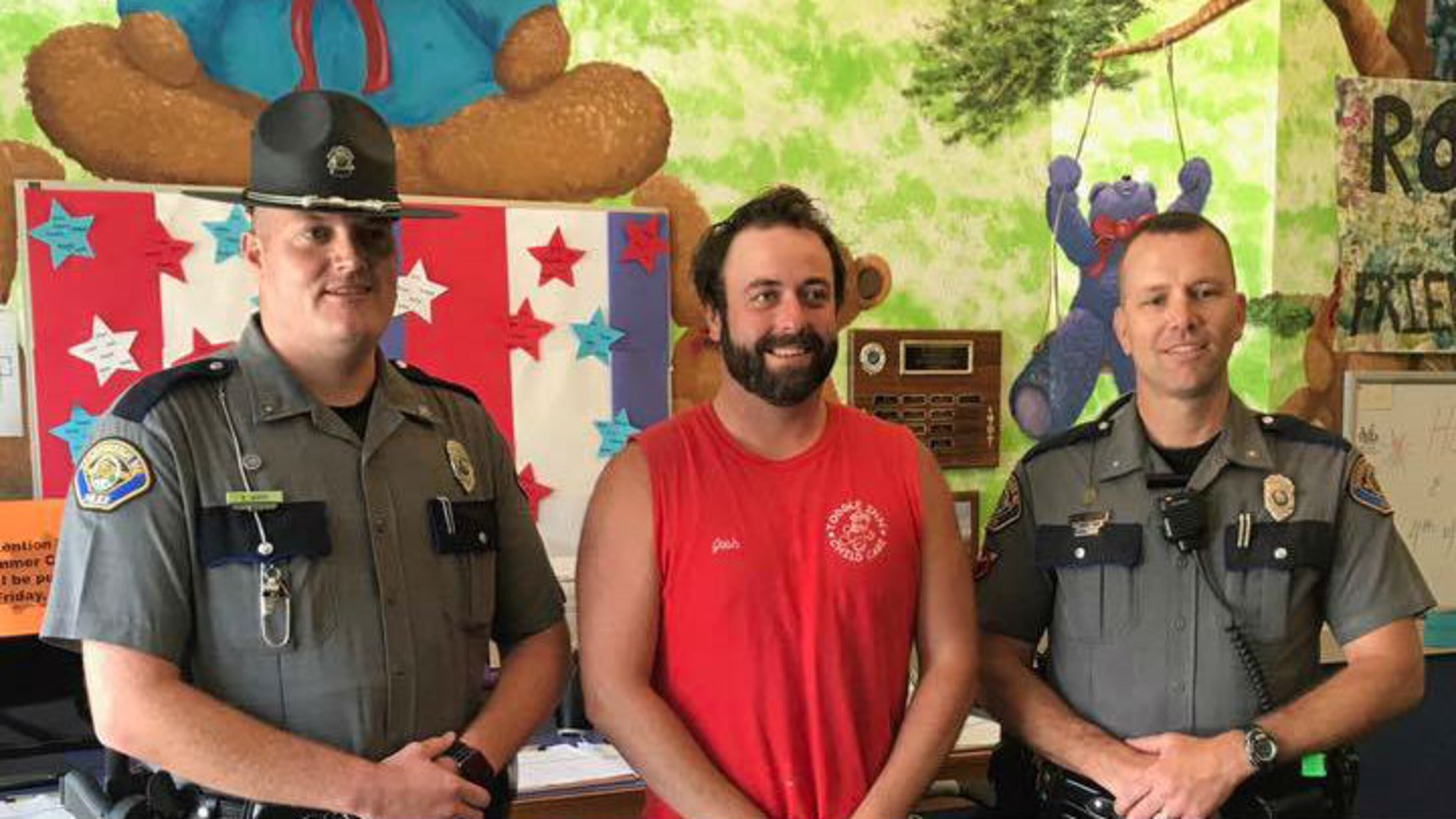 Joshua Galvin, a preschool teacher at Toddle Inn Child Care in South Portland, Maine, is honored Thursday, July 6, 2017, for saving the lives of 25 of the center's students. Galvin and the children were on a trip Wednesday when their bus driver suffered a heart attack at the wheel.