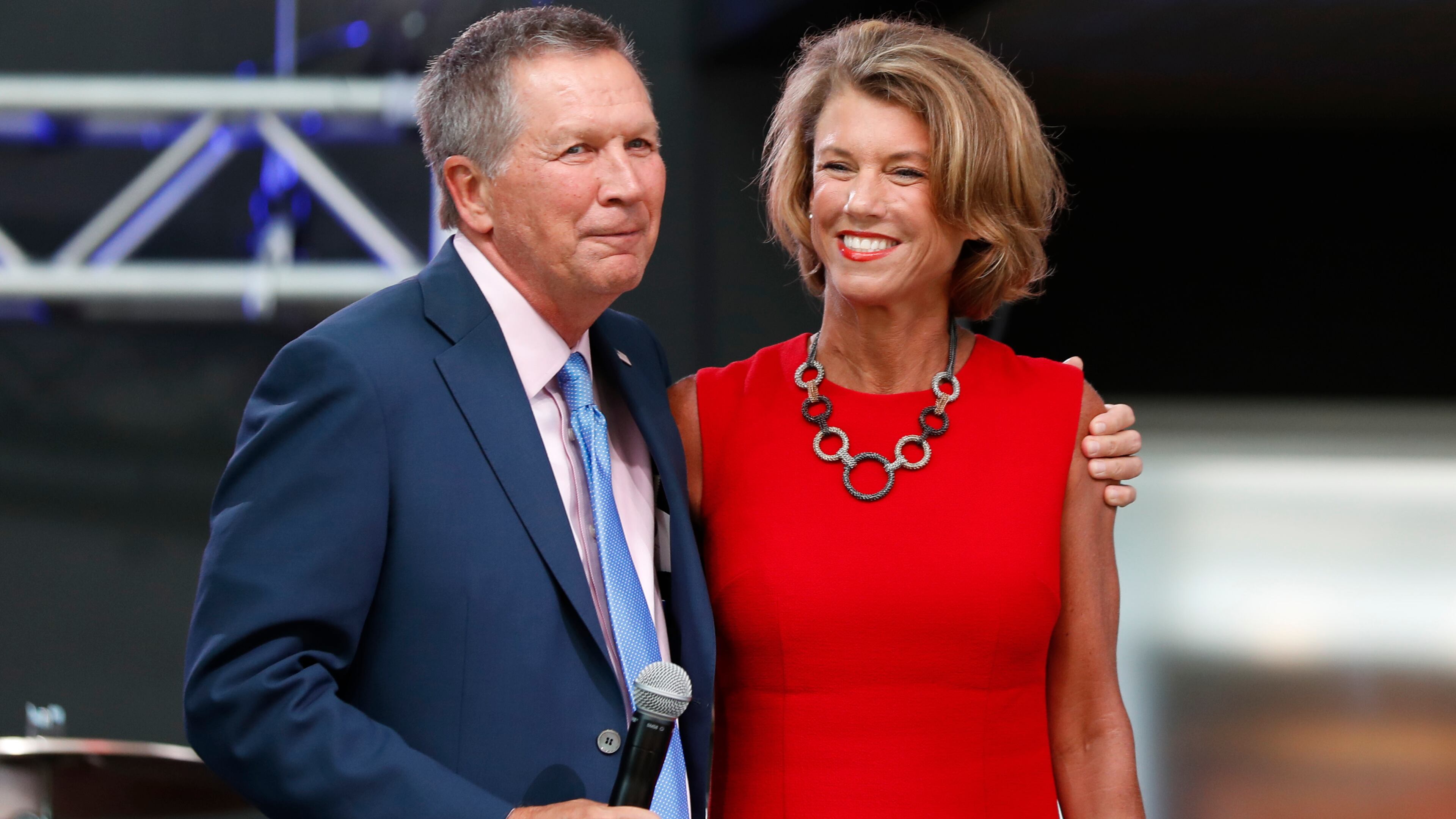 Ohio Gov. John Kasich, left, arrives with his wife Karen at the The Rock and Roll Hall of Fame and Museum on Tuesday, July 19, 2016, in Cleveland, during the second day of the Republican convention. AP/Alex Brandon