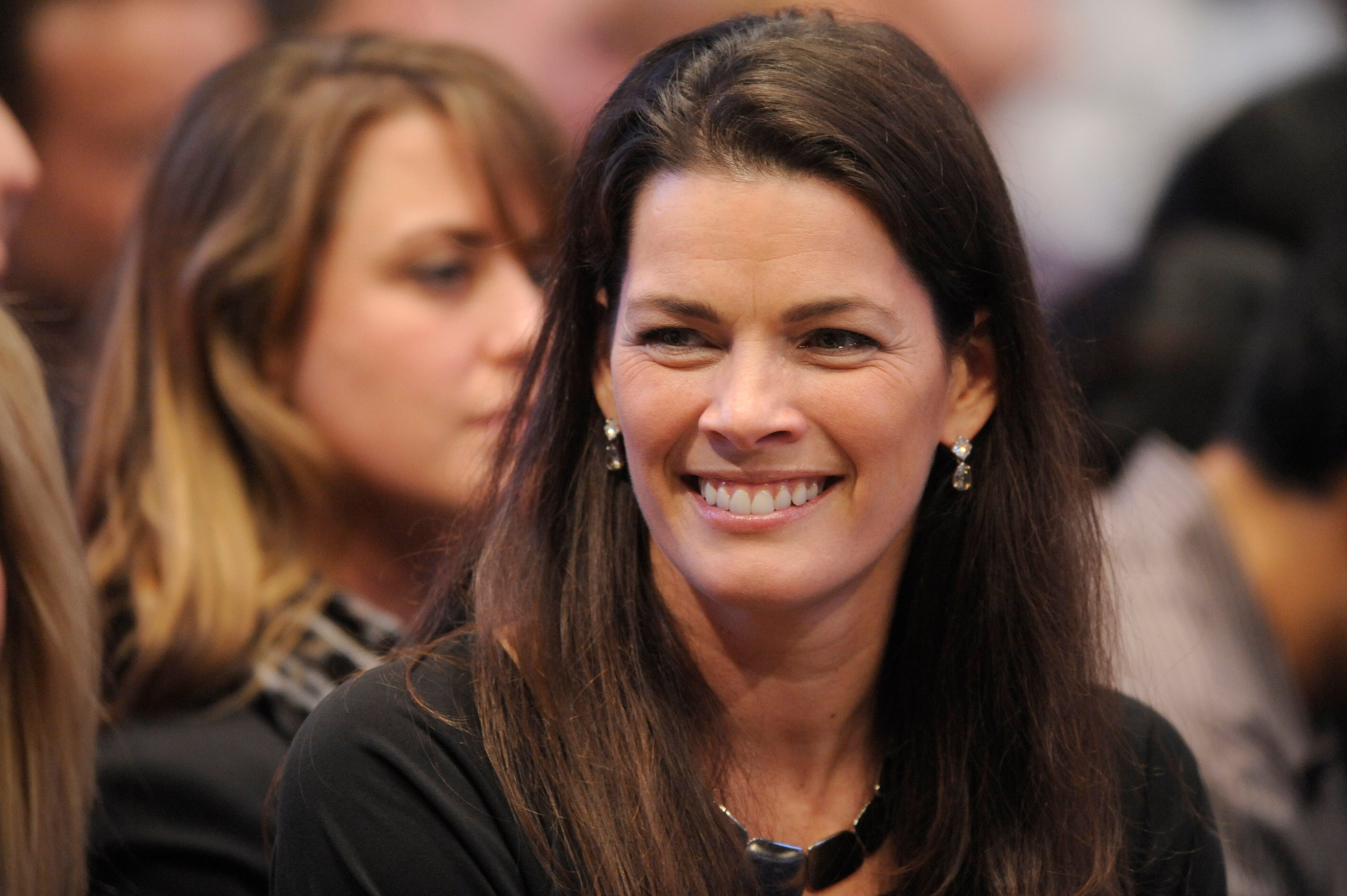 ADVANCE FOR MONDAY, DEC. 23 - FILE - In this Feb. 28, 2011, file photo, former figure skater Nancy Kerrigan watches an exhibition tennis match between Pete Sampras and Andre Agassi at Madison Square Garden in New York. It's been nearly 20 years since Kerrigan was clubbed after practice by a member of a bumbling goon squad hired by Tonya Harding's ex-husband with the hope of eliminating his former wife's top competition for the U.S. Olympic team. (AP Photo/Henny Ray Abrams, File)