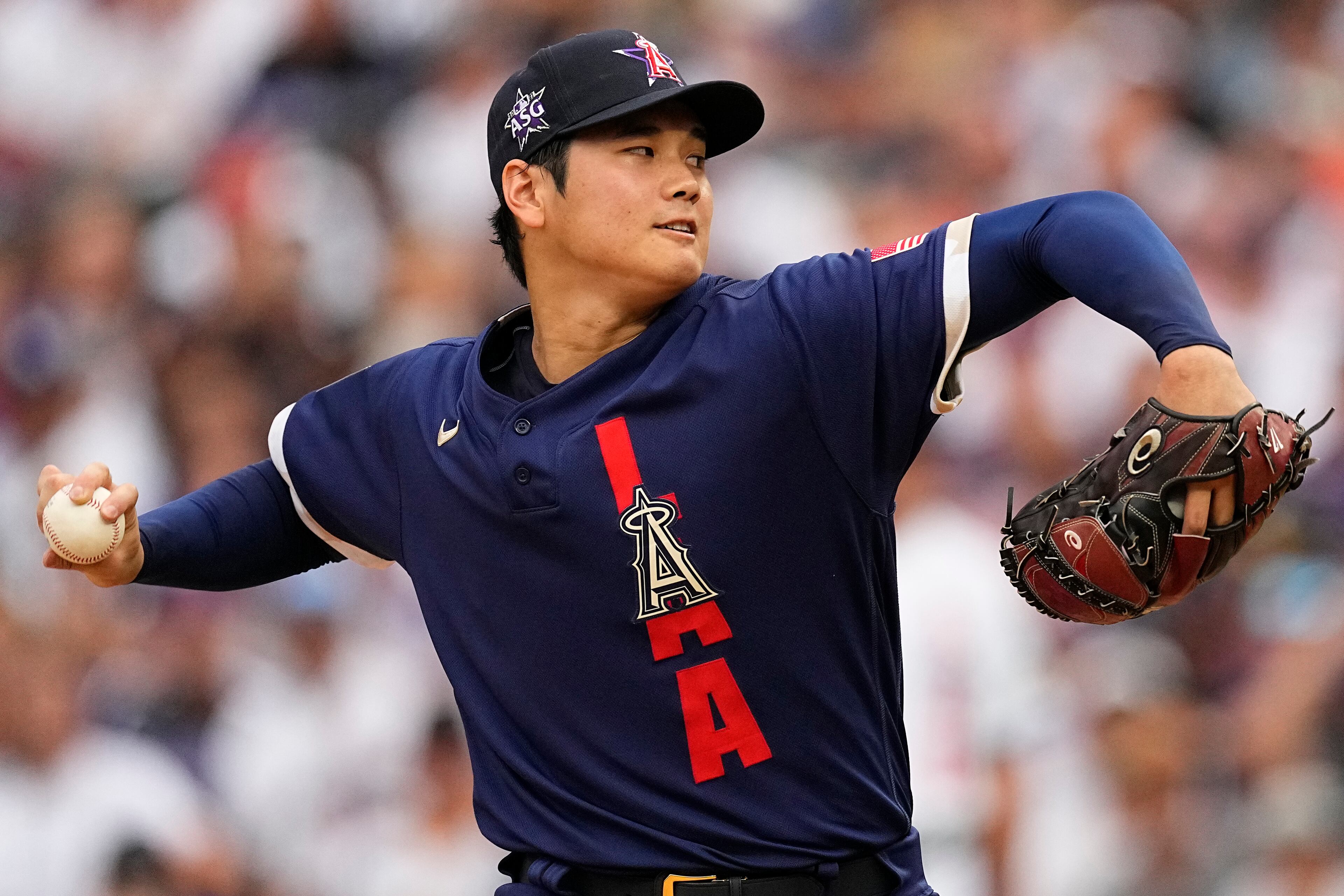 American League's starting pitcher Shohei Ohtani, of the Los Angeles Angeles, throws during the first inning of the MLB All-Star baseball game, Tuesday, July 13, 2021, in Denver. (AP Photo/Jack Dempsey)