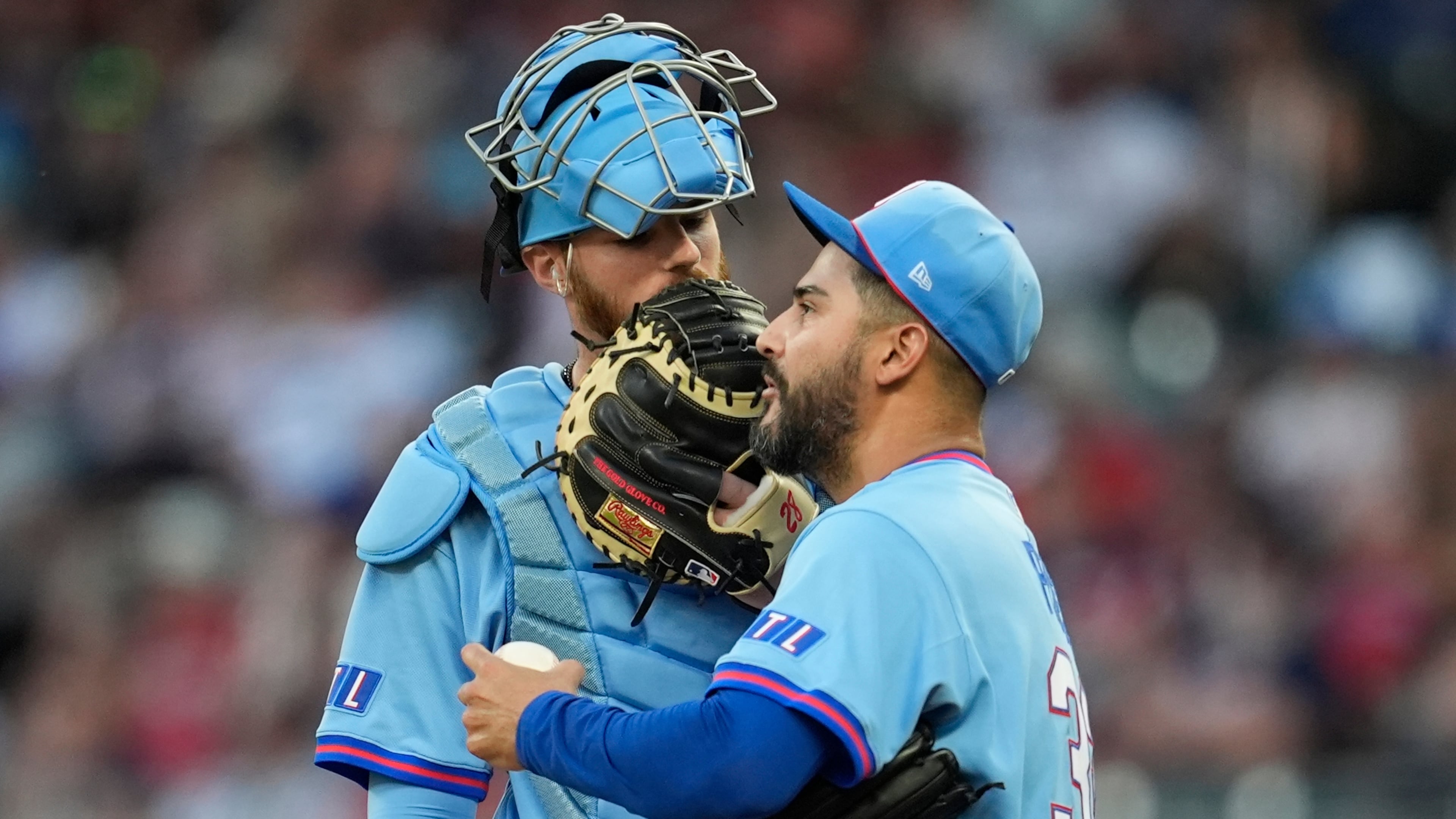 Atlanta Braves' pitcher Martín Pérez speaks with Jonah Heim in the second inning of a baseball game against the Cleveland Guardians, Saturday, April 11, 2026, in Atlanta. (AP Photo/Mike Stewart)