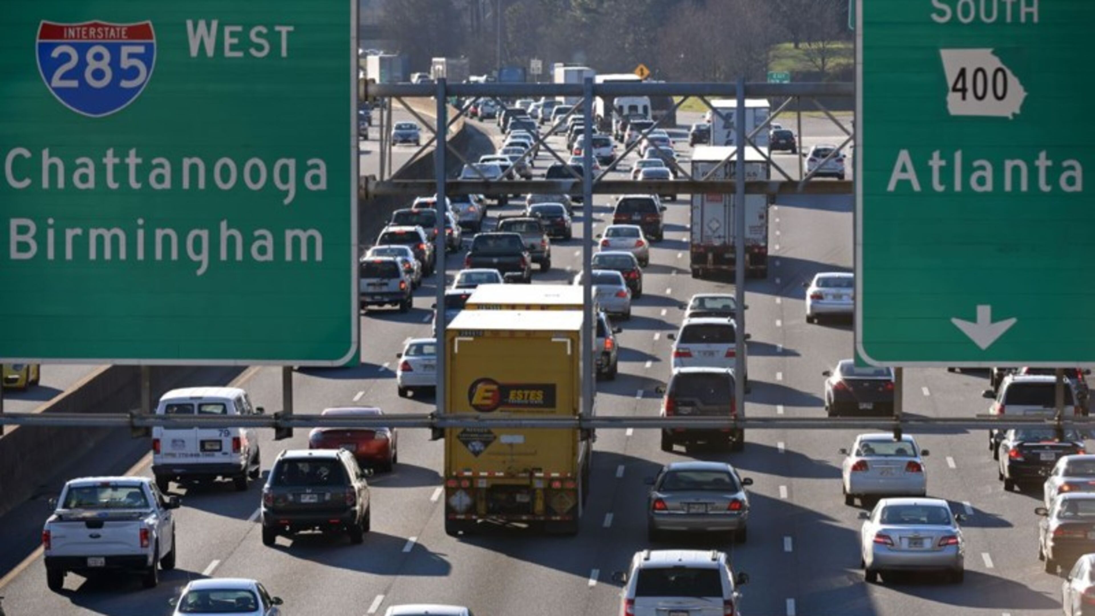 The Georgia Department of Transportation will delay construction of toll lanes on I-285 and Ga. 400, while accelerating construction on road projects elsewhere.