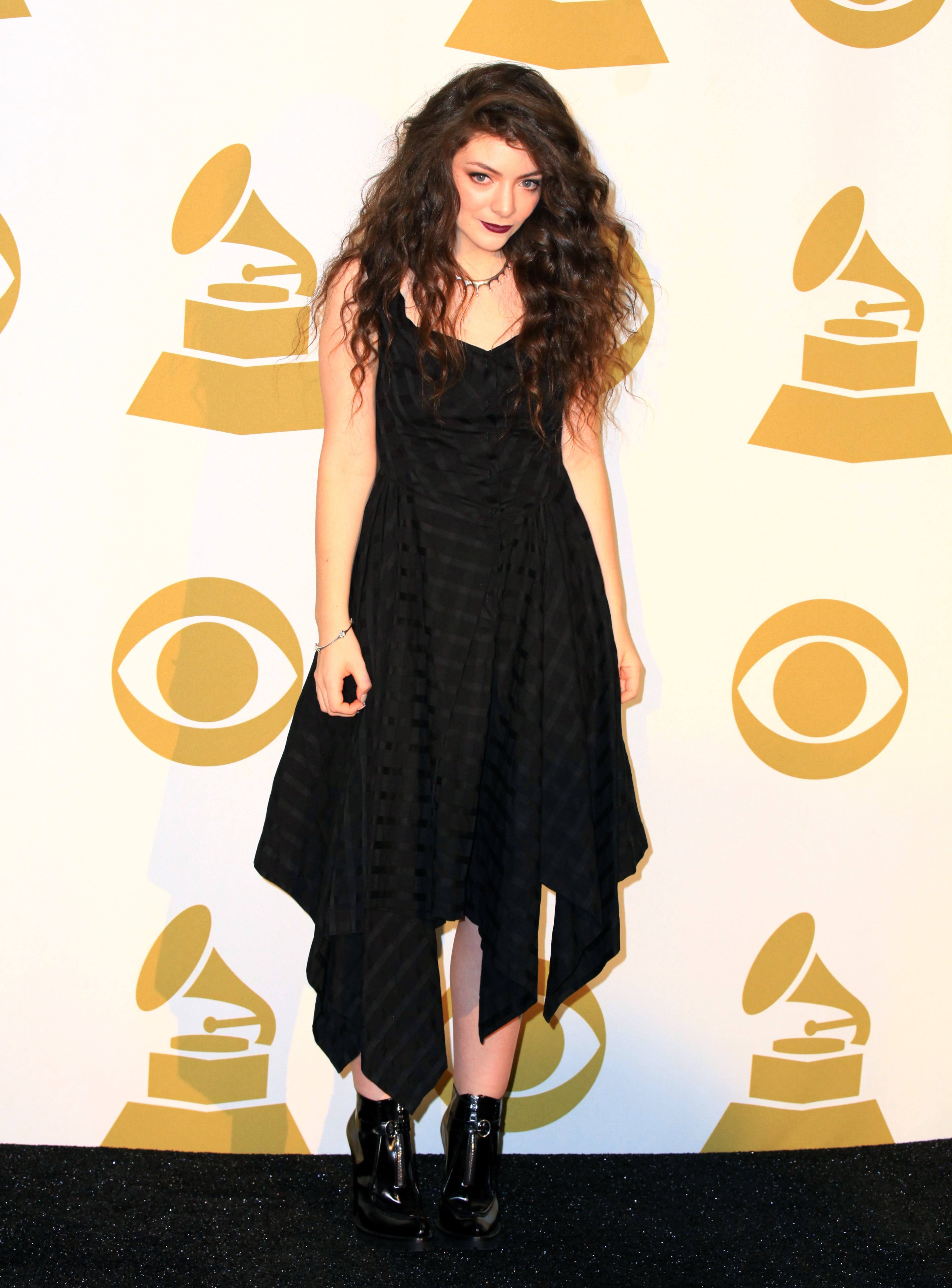 LOS ANGELES, CA - DECEMBER 06: Recording artist Lorde poses in the press room during The GRAMMY Nominations Concert Live!! Countdown To Music's Biggest Night at Nokia Theatre L.A. Live on December 6, 2013 in Los Angeles, California. (Photo by Gabriel Olsen/Getty Images)