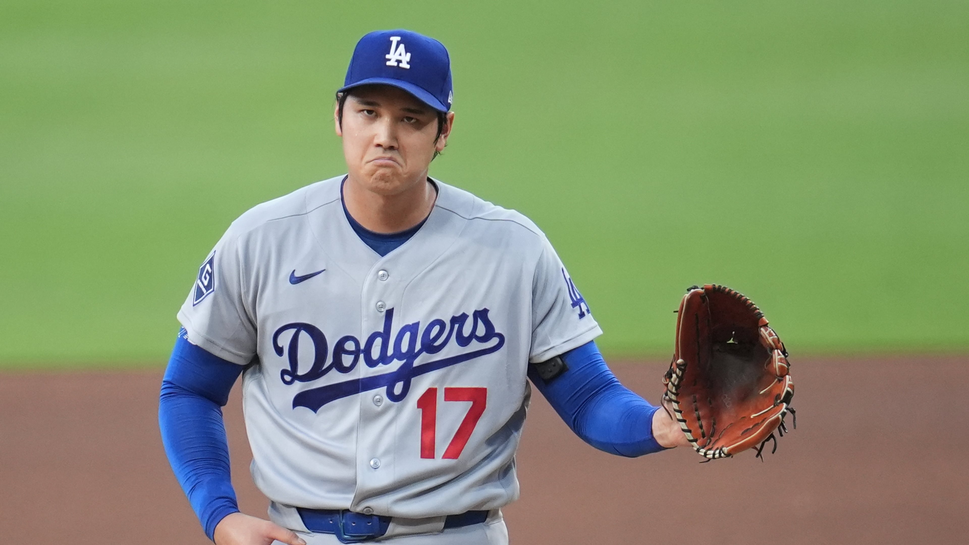 Los Angeles Dodgers starting pitcher Shohei Ohtani gestures as he works against a San Diego Padres batter during the fifth inning of a baseball game Wednesday, May 20, 2026, in San Diego. (AP Photo/Gregory Bull)