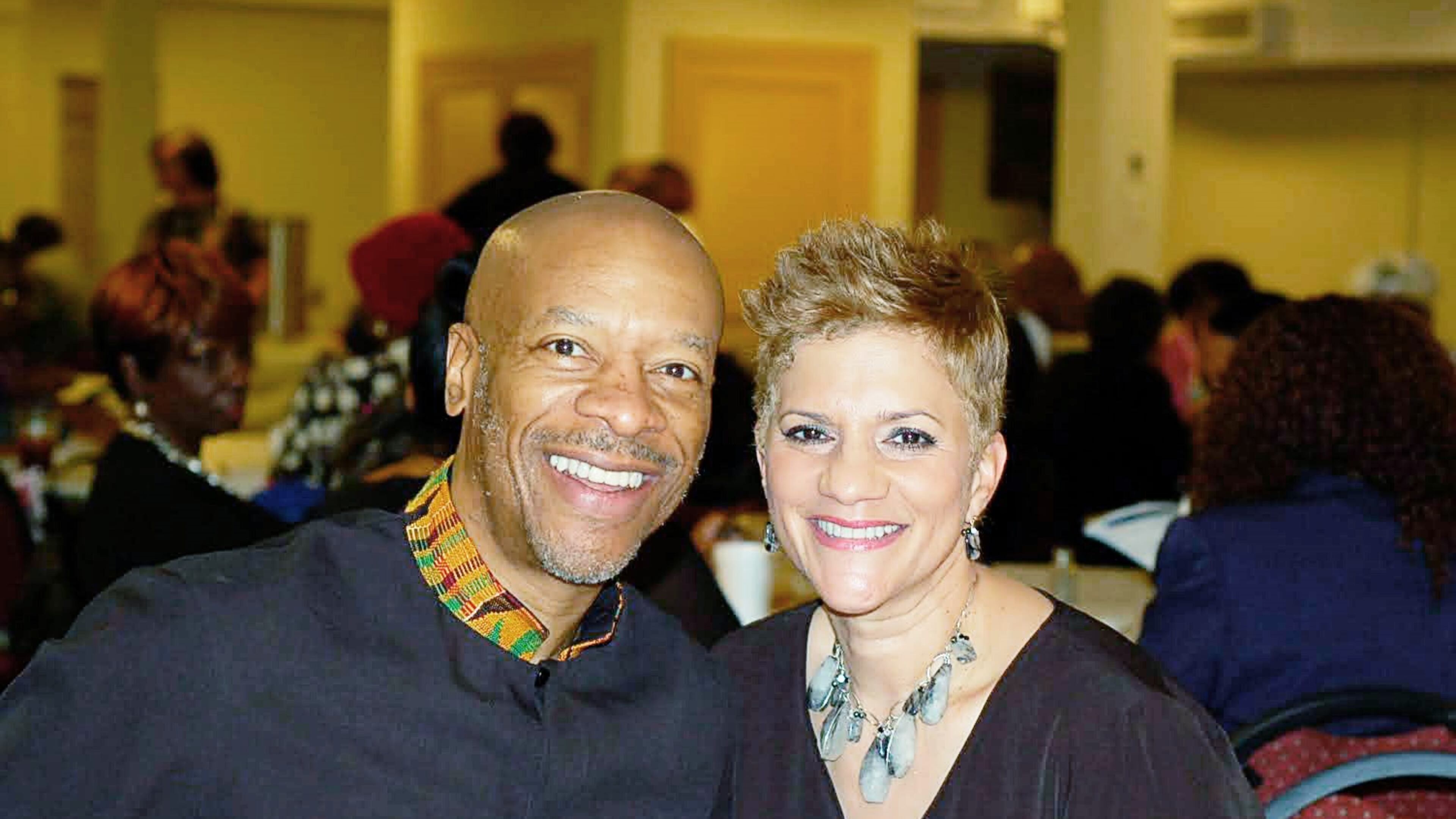 Toussaint Hill, left, with his wife Laurel Hill.