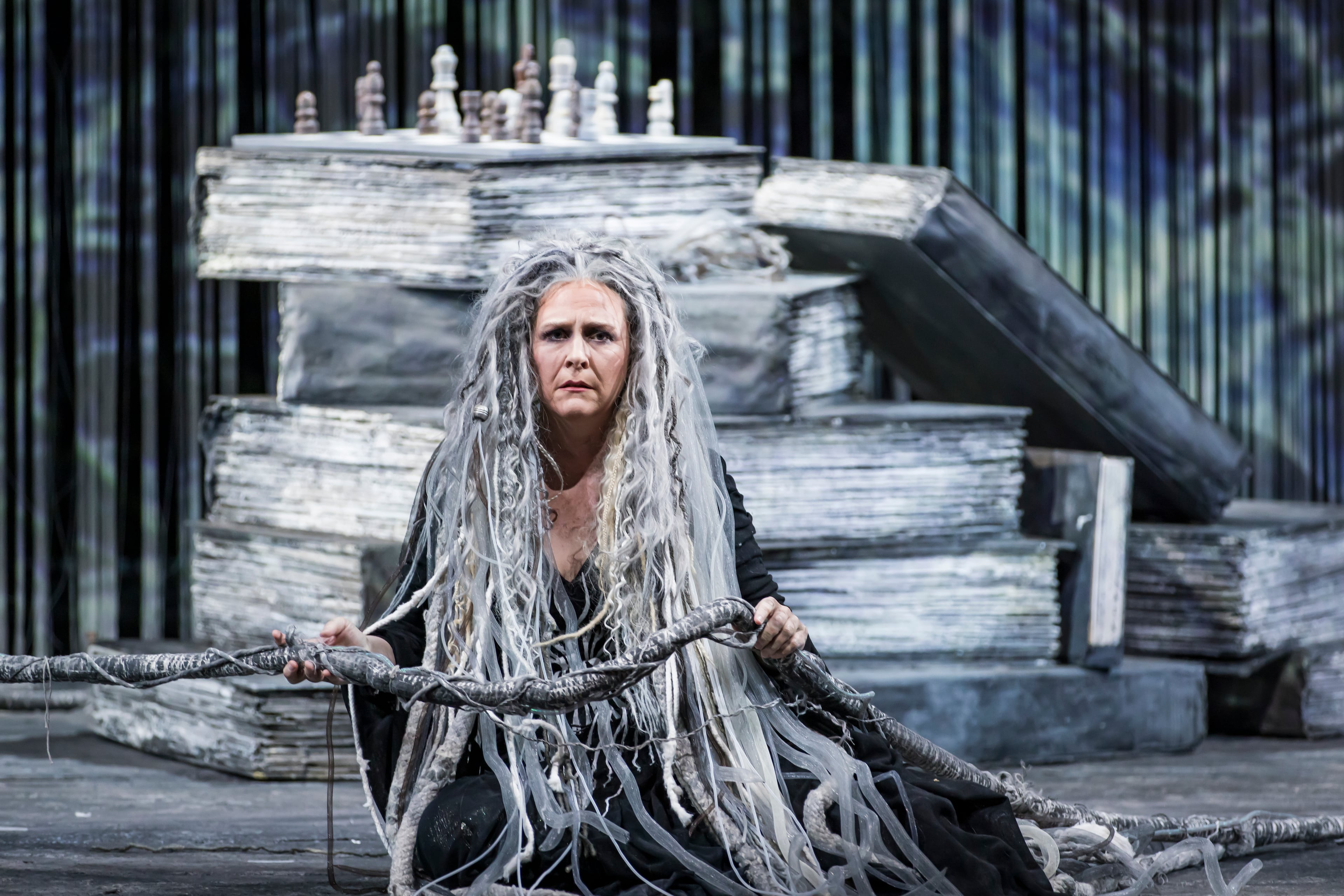 Caitlin Lynch shines as Third Norn in the Atlanta Opera’s "Twilight of the Gods." The production by director Tomer Zvulun and scenic and projection designer Erhard Rom frames the action inside a brutal, violent society suggestive of modern fascism. (Raftermen/Courtesy of Atlanta Opera)