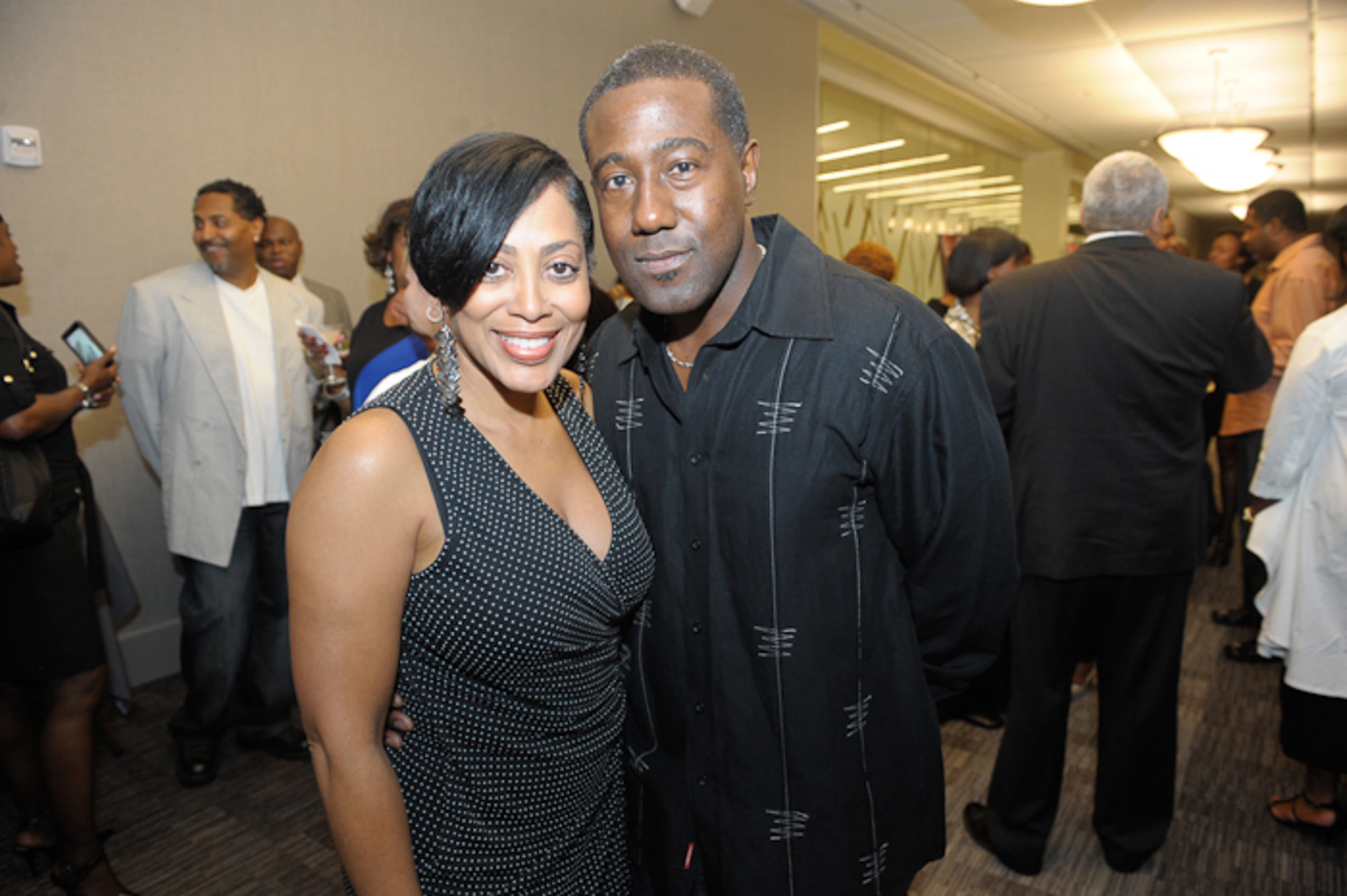 Actor E. Roger Mitchell and a guest attend the Atlanta premiere for Lifetime's "Steel Magnolias." Look for Mitchell in the upcoming sequel of 'Hunger Games."