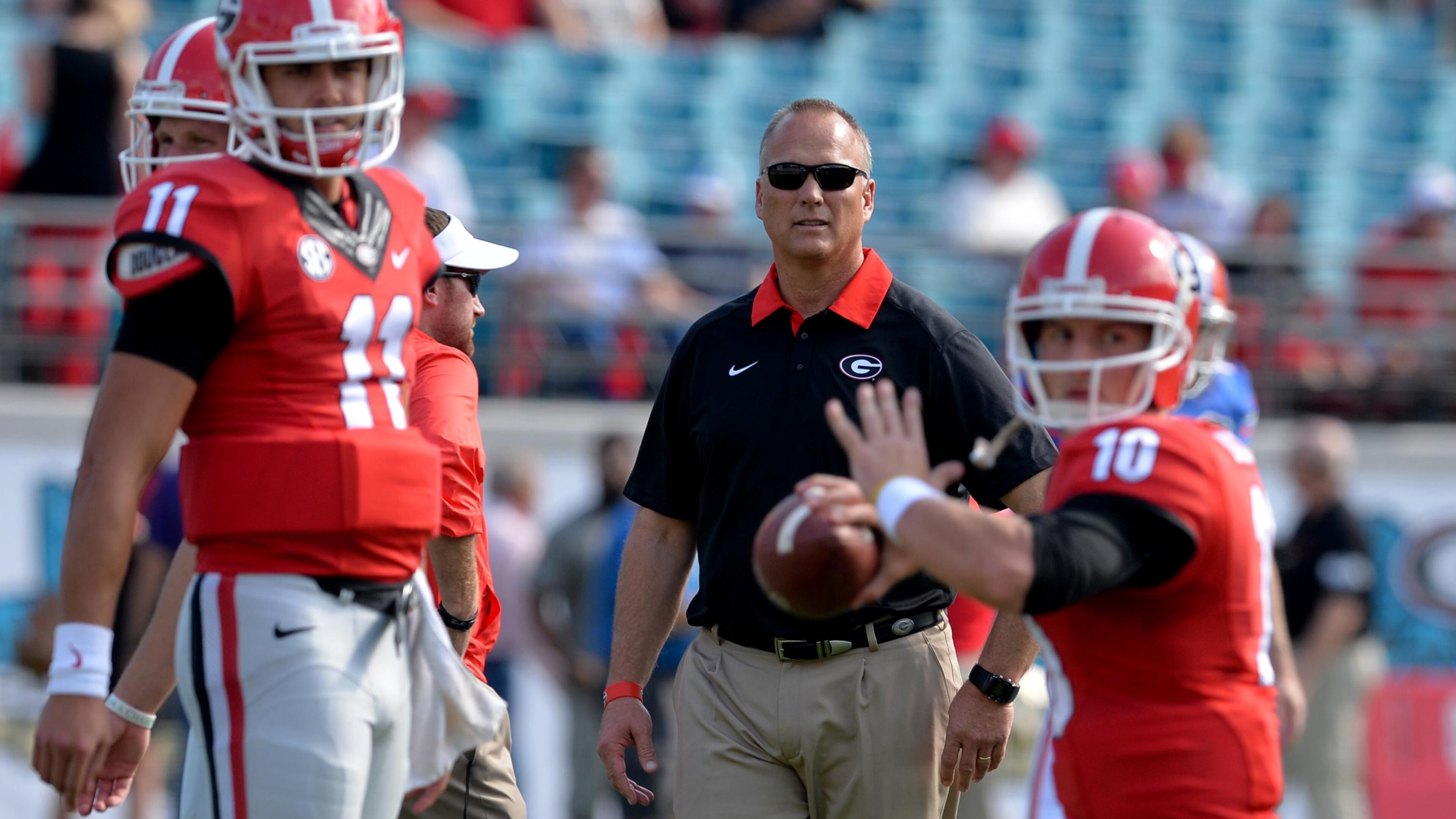 Georgia head coach Mark Richt watches quarterback Faton Bauta throw before the game against Florida in 2015 in Jacksonville, Fla. This was Richt’s final season as the Bulldogs’ head coach.