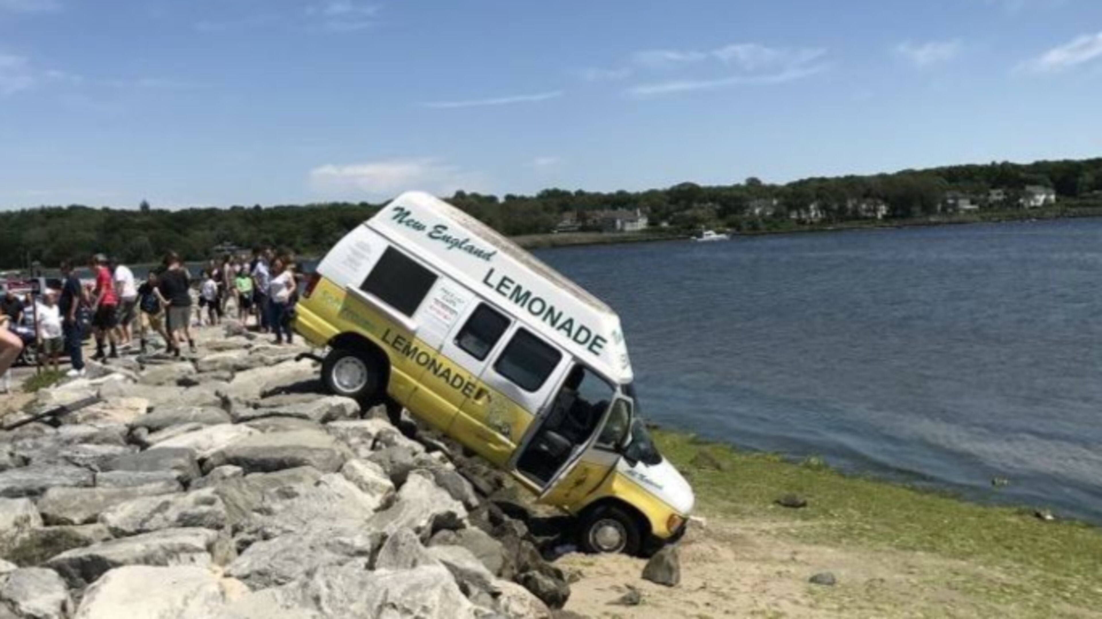 A lemonade truck teeters at an awkward angle at Oakland Beach in Warwick, R.I.