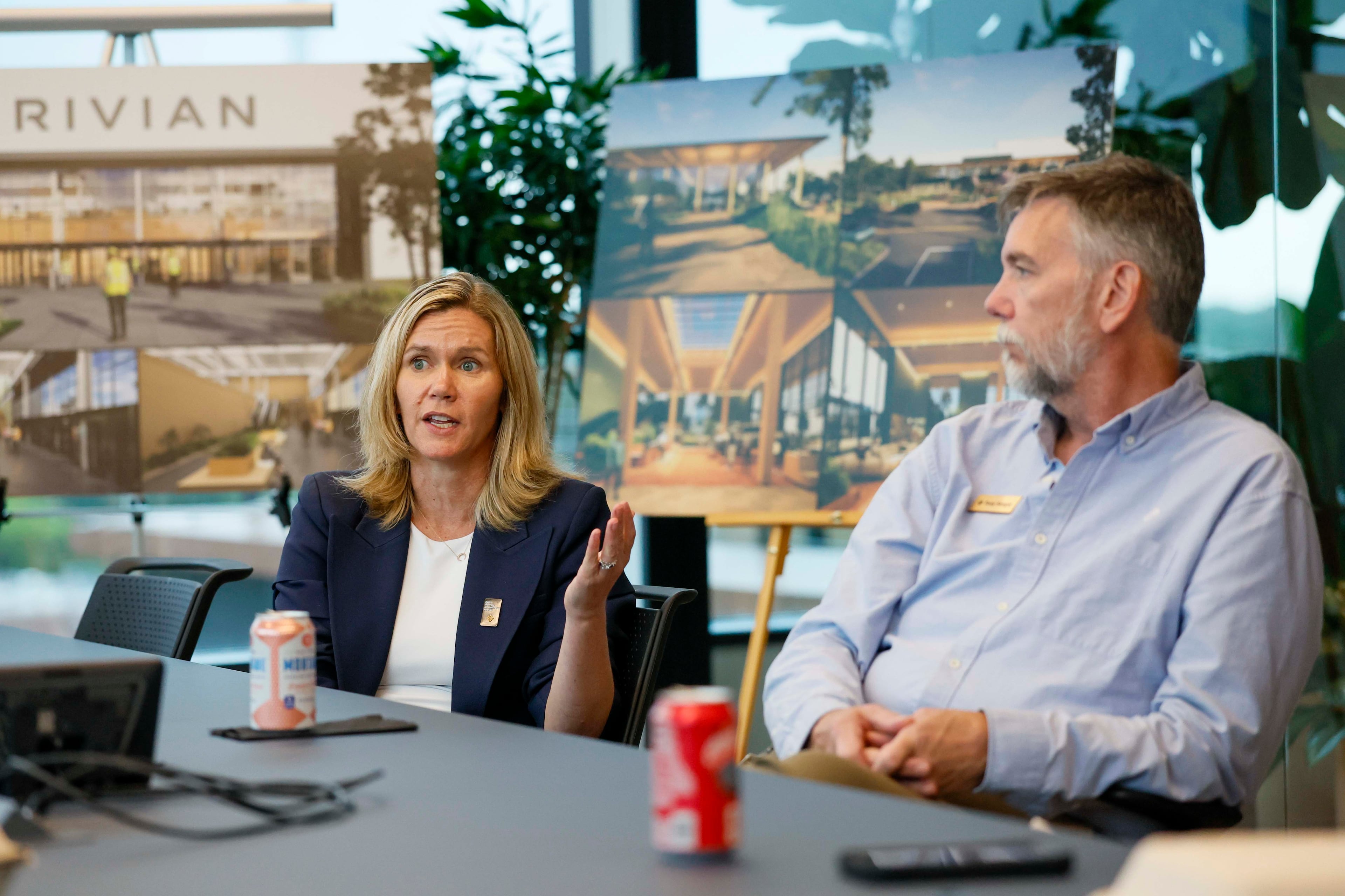 Rivian Chief Financial Officer Claire McDonough (left) and Vice President for Georgia facilities Tony Sanger (right) answer questions after a tour of the company's new East Coast headquarters in Atlanta on Tuesday, August 4, 2026. (Miguel Martinez/AJC)