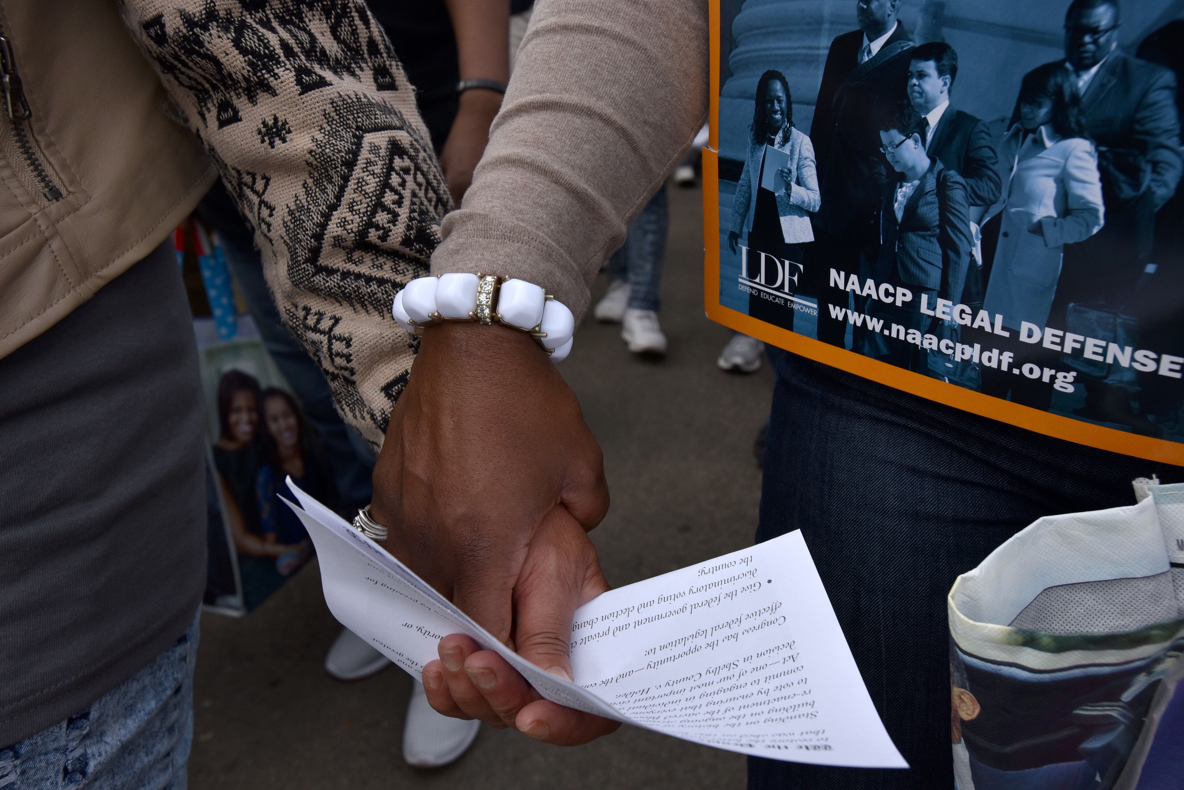 March 8, 2015 Selma, Alabama - Crowds of people take a symbolic walk across the Edmund Pettus Bridge in Selma on Sunday, March 8, 2015. Thousands of people took part in a bridge crossing reenactment in Selma on Sunday to commemorate the 50th anniversary of Bloody Sunday. HYOSUB SHIN / HSHIN@AJC.COM