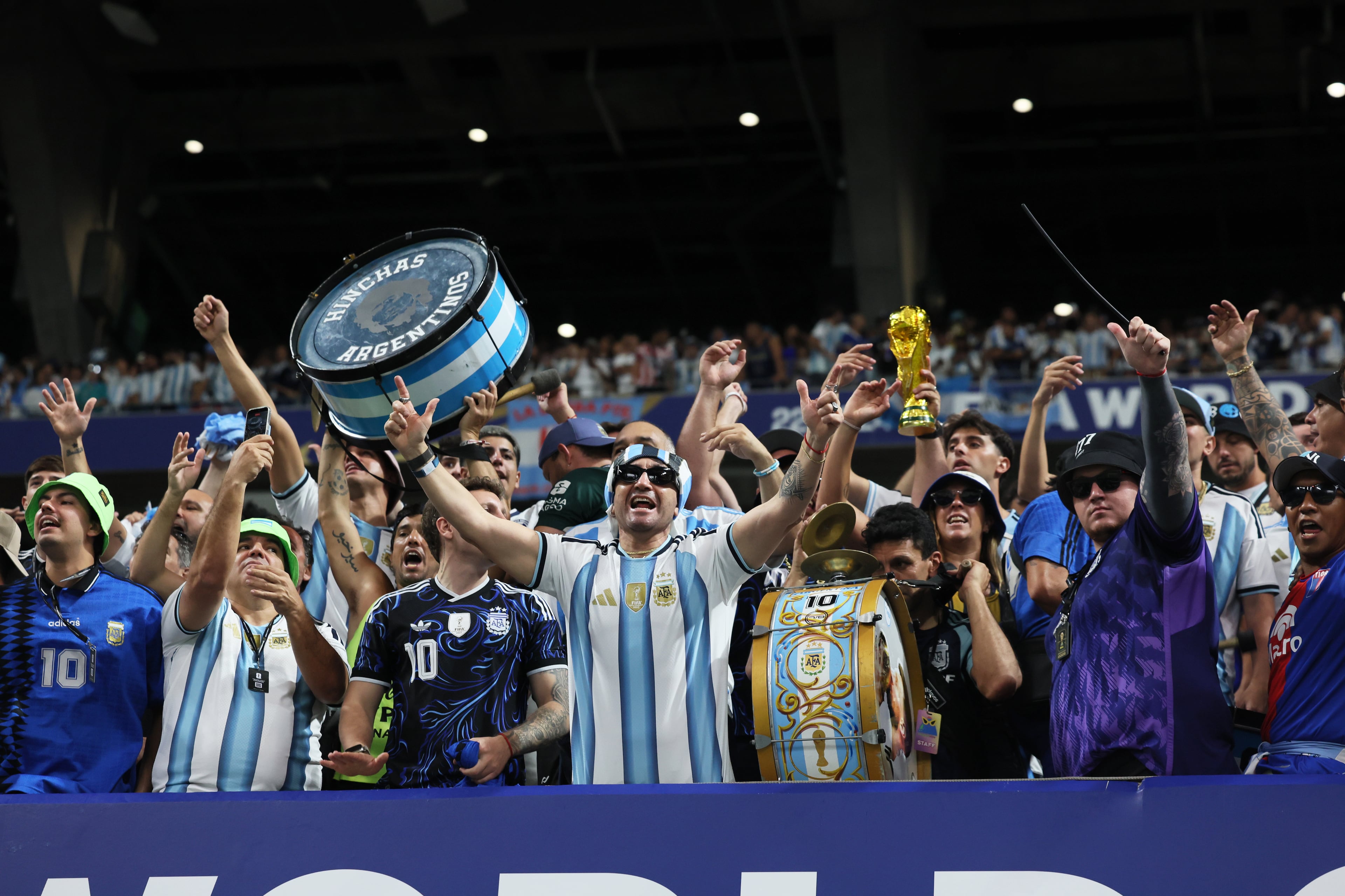 Argentina fans cheer as their team appears on the pitch before the start of Argentina vs. England FIFA World Cup Semifinal match at Atlanta Stadium (Mercedes-Benz Stadium) on Wednesday, July 15, 2026. (Jason Getz/AJC)