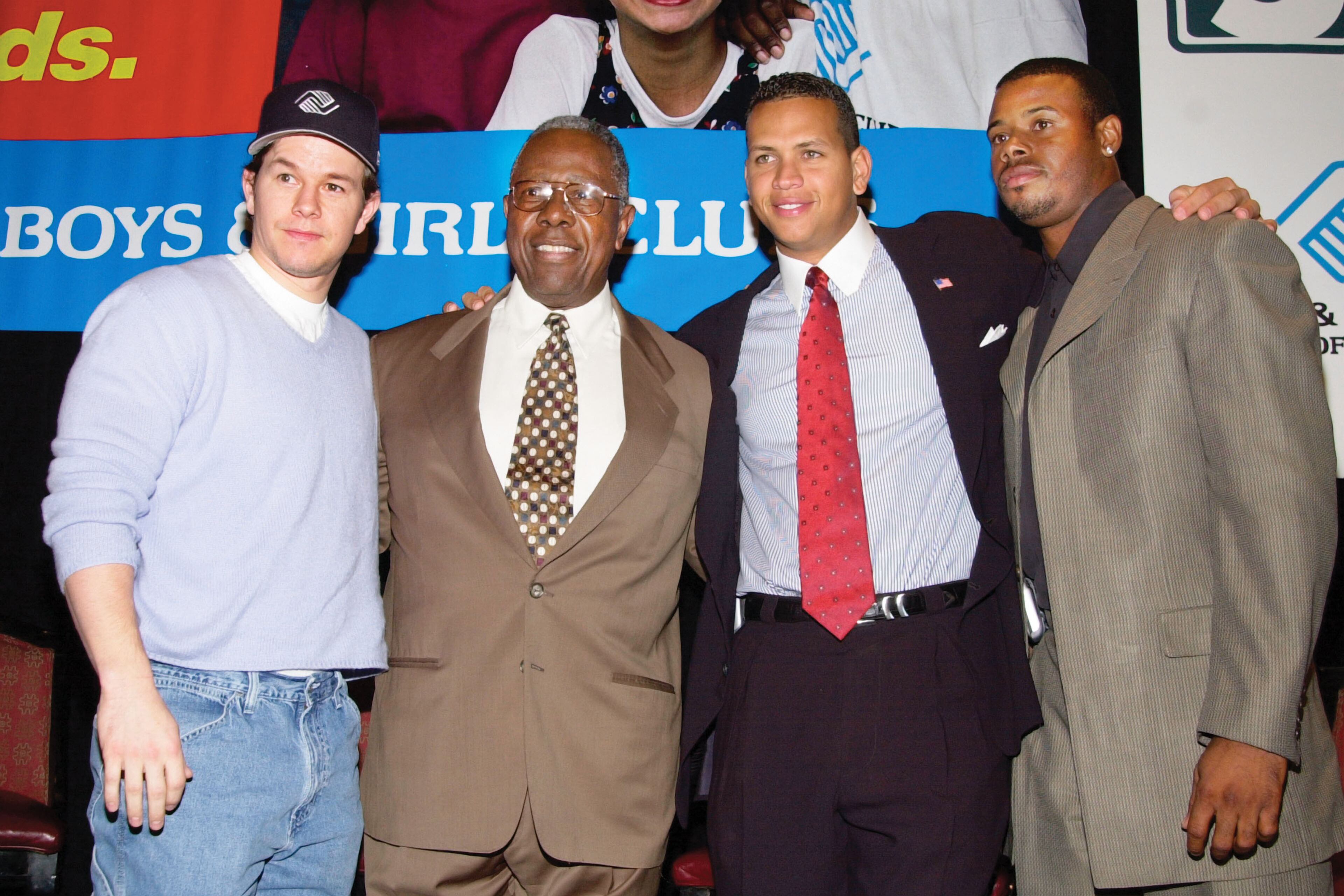 2001: Actor Mark Wahlberg, baseball Hall of Famer Hank Aaron, baseball superstars Alex Rodriguez and Ken Griffey, Jr. announce the launch of "Campaign 3 P.M." at the Waldorf-Astoria December 12, 2001 in New York. The Campaign seeks to provide a sanctuary of safe activities for all children in the after-school hours. (Photo by Lawrence Lucier/Getty Images)