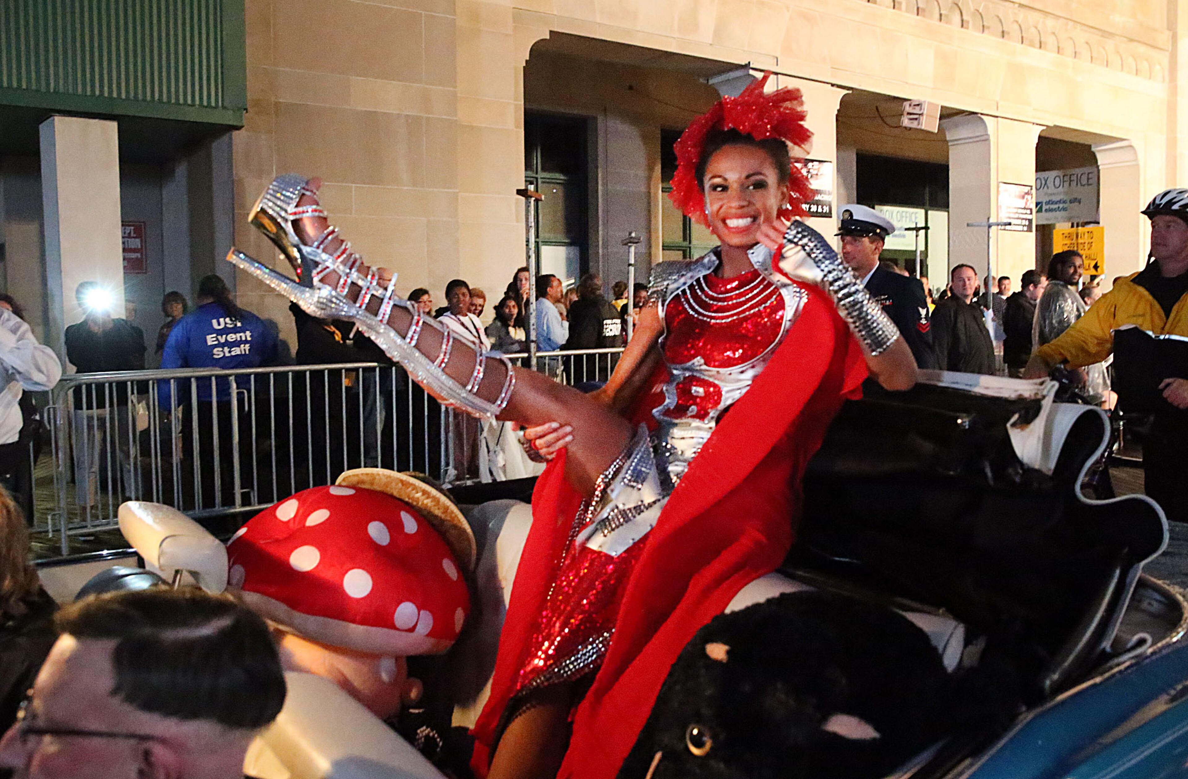 Miss New Jersey Cierra Kaler-Jones passes Boardwalk Hall, Saturday, Sept. 13 2014, Miss America Parade, Atlantic City Boardwalk. (AP Photo/The Press of Atlantic City, Ben Fogletto)