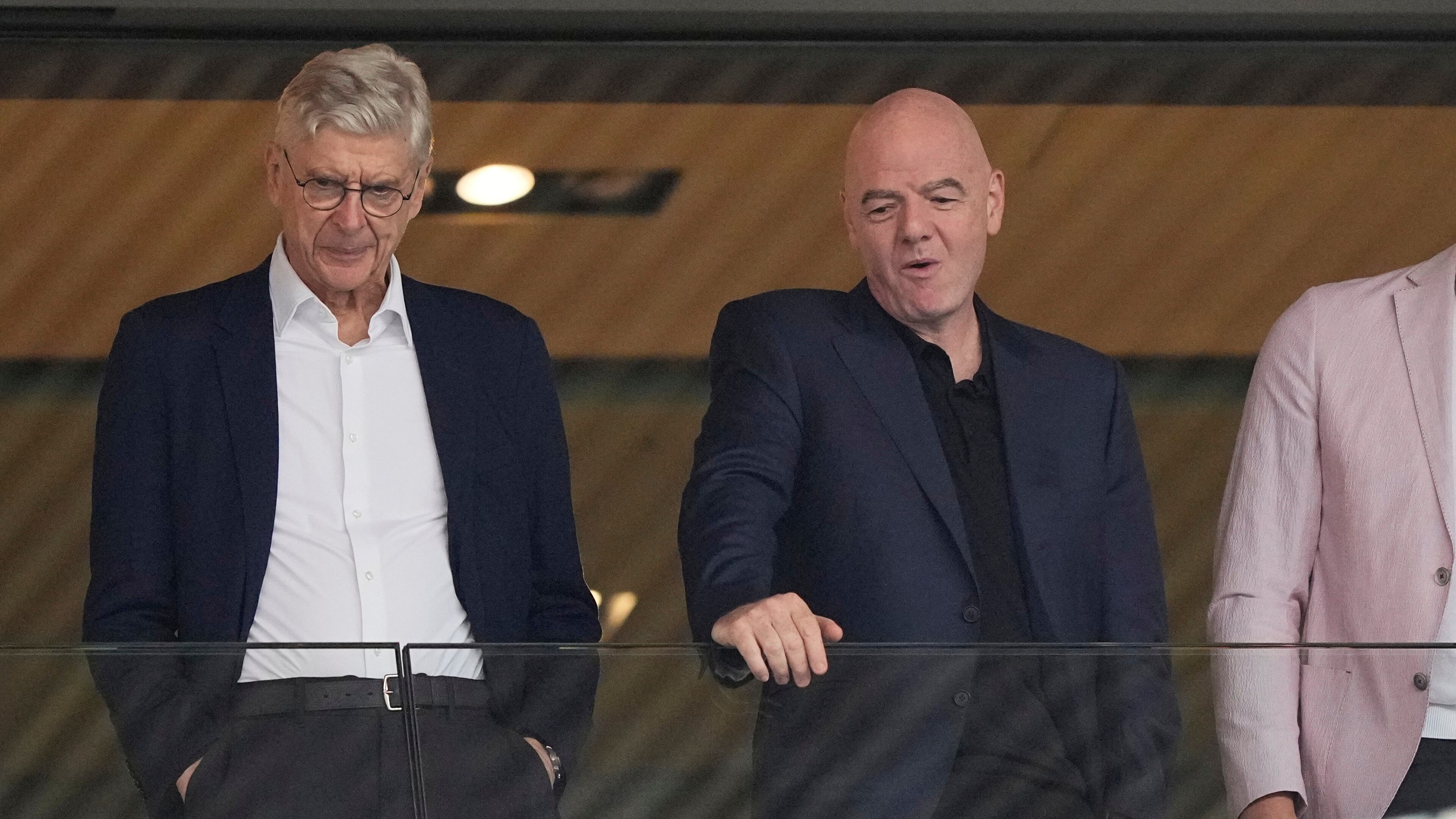 FILE - FIFA president Gianni Infantino, right, and Arsene Wenger, Chief Officer (FIFA) and former soccer coach arrive for the Women's Euro 2025 quarterfinals soccer match between Sweden and England at Stadion Letzigrund in Zurich, Switzerland, Thursday, July 17, 2025. (AP Photo/Martin Meissner, File)