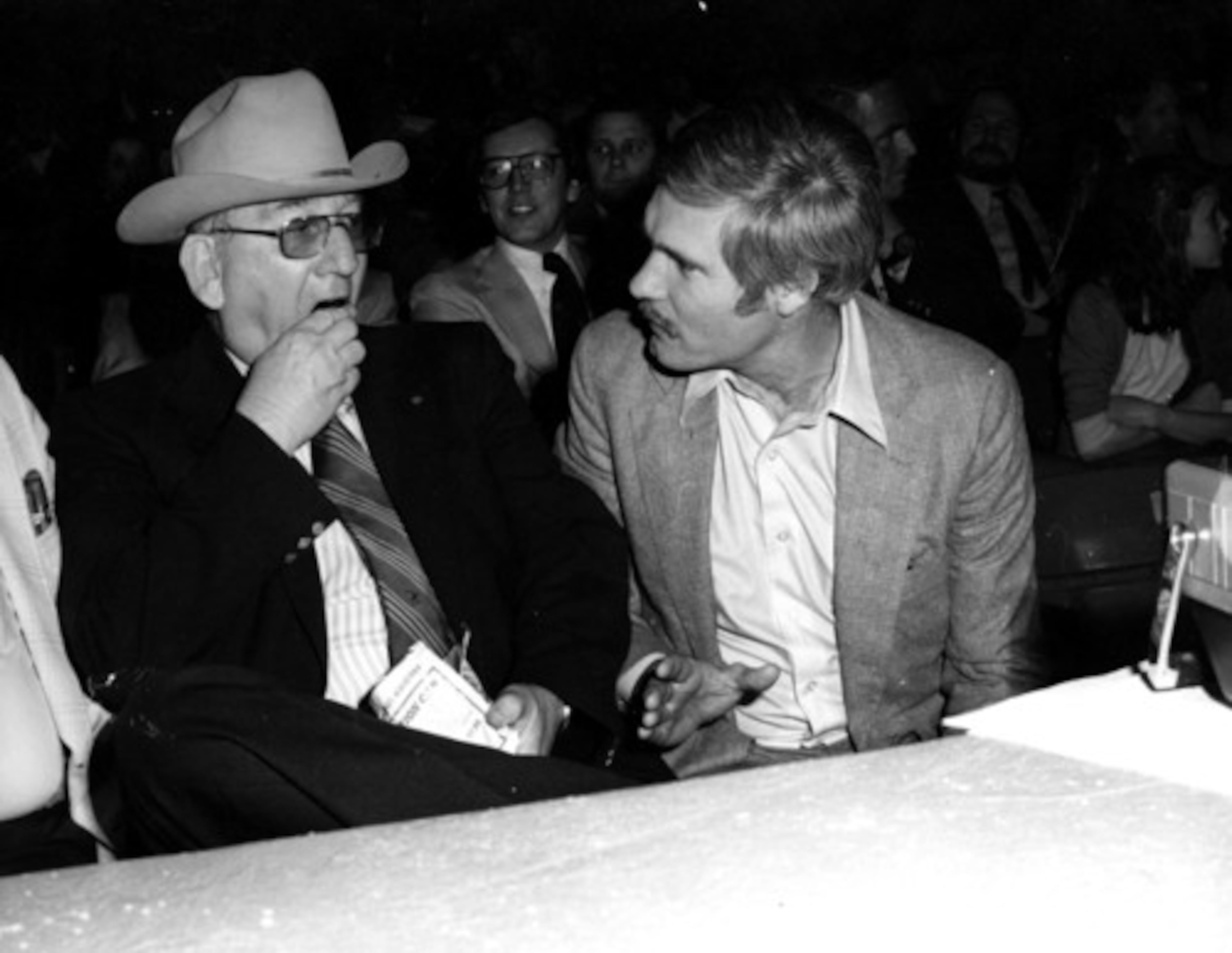 Two Atlanta legends -Murphy, taking a chew of tobacco, and Ted Turner.