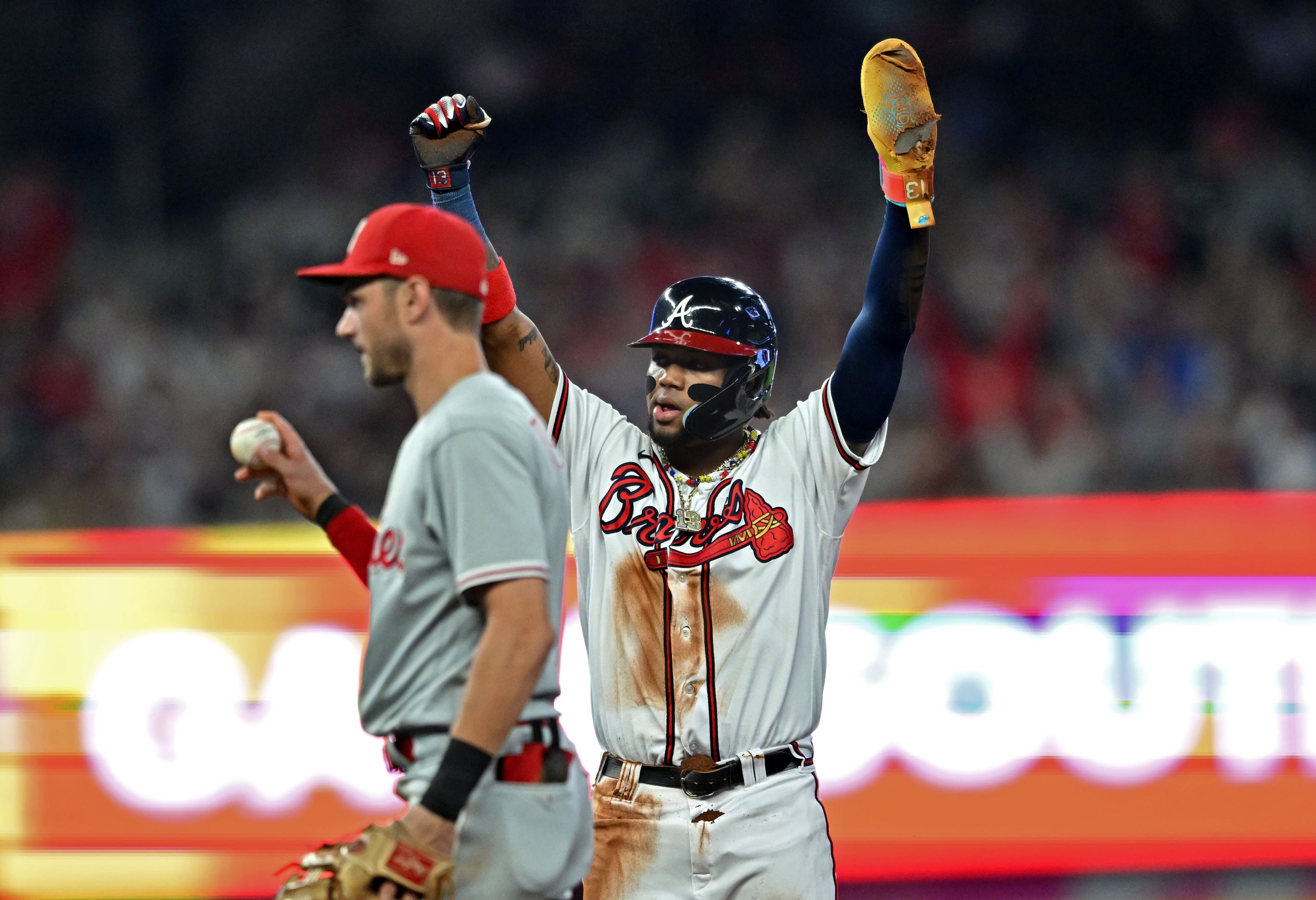 Atlanta Braves' right fielder Ronald Acuna Jr. (13) celebrates after stealing second base during the fifth inning at Truist Park, Tuesday, September 19, 2023, in Atlanta. Atlanta Braves won 9-3 over Philadelphia Phillies. (Hyosub Shin / Hyosub.Shin@ajc.com)