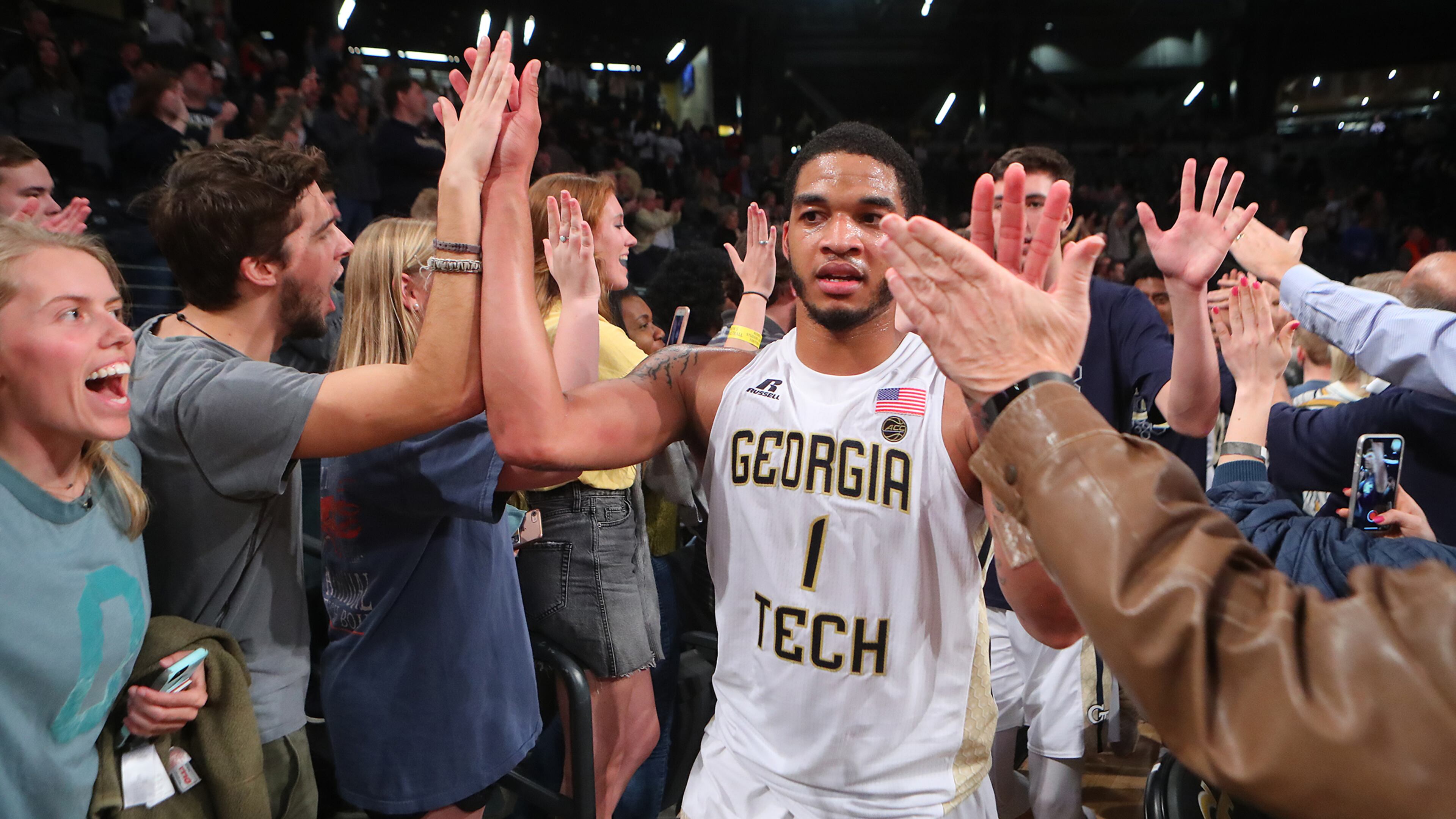 November 28, 2017 Atlanta: Georgia Tech guard Tadric Jackson high fives fans after his game winning shot at the horn for a 52-51 victory over Northwestern in a NCAA college basketball game on Tuesday, November 28, 2017, in Atlanta. Curtis Compton/ccompton@ajc.com