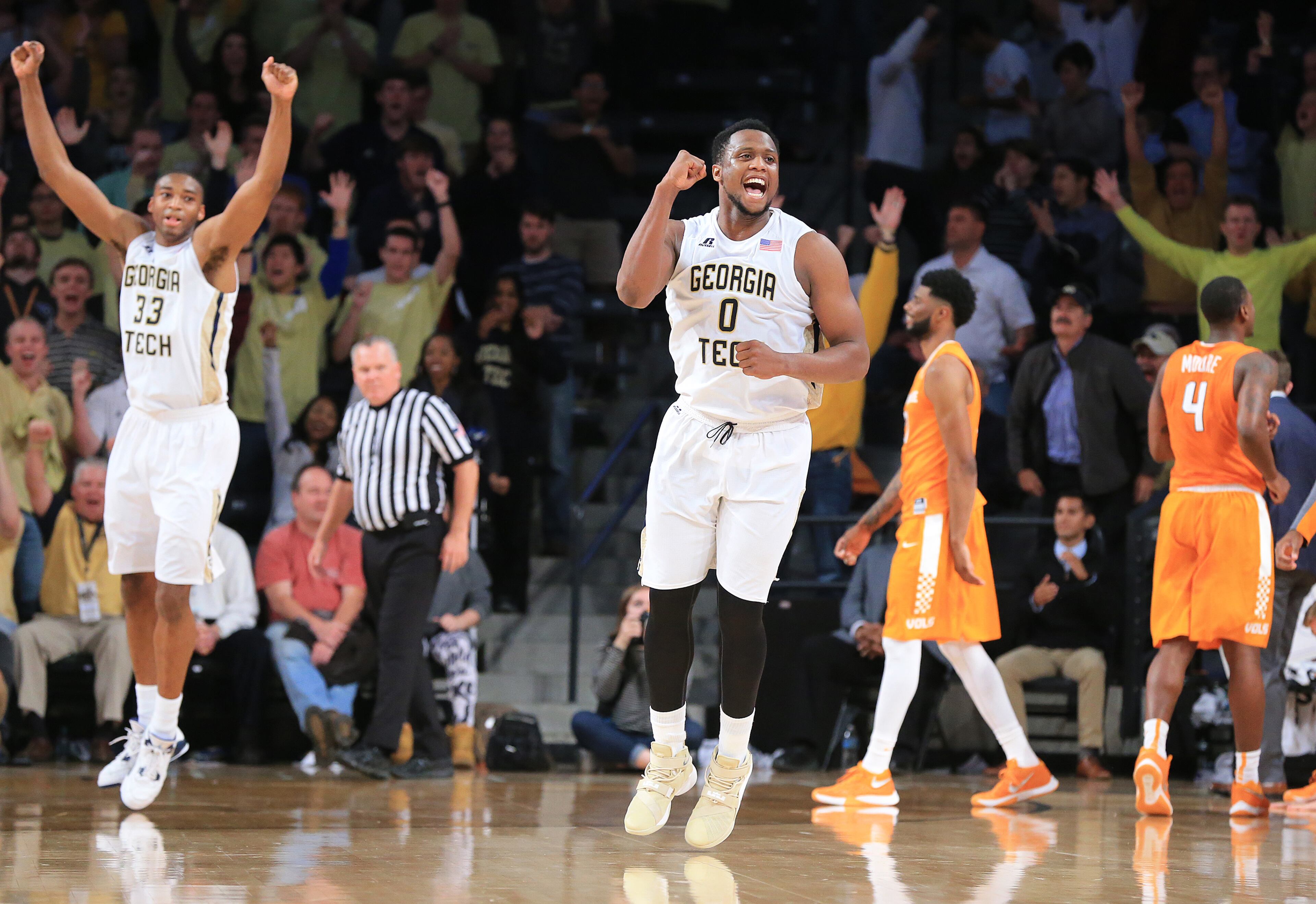 Georgia Tech forwards James White (left) and Charles Mitchell react as time expires with Tennessee missing their last second shot allowing the Jackets to hold on to beat Tennessee 69-67 in a basketball game on Monday, Nov. 16, 2015 in Atlanta. Curtis Compton / ccompton@ajc.com