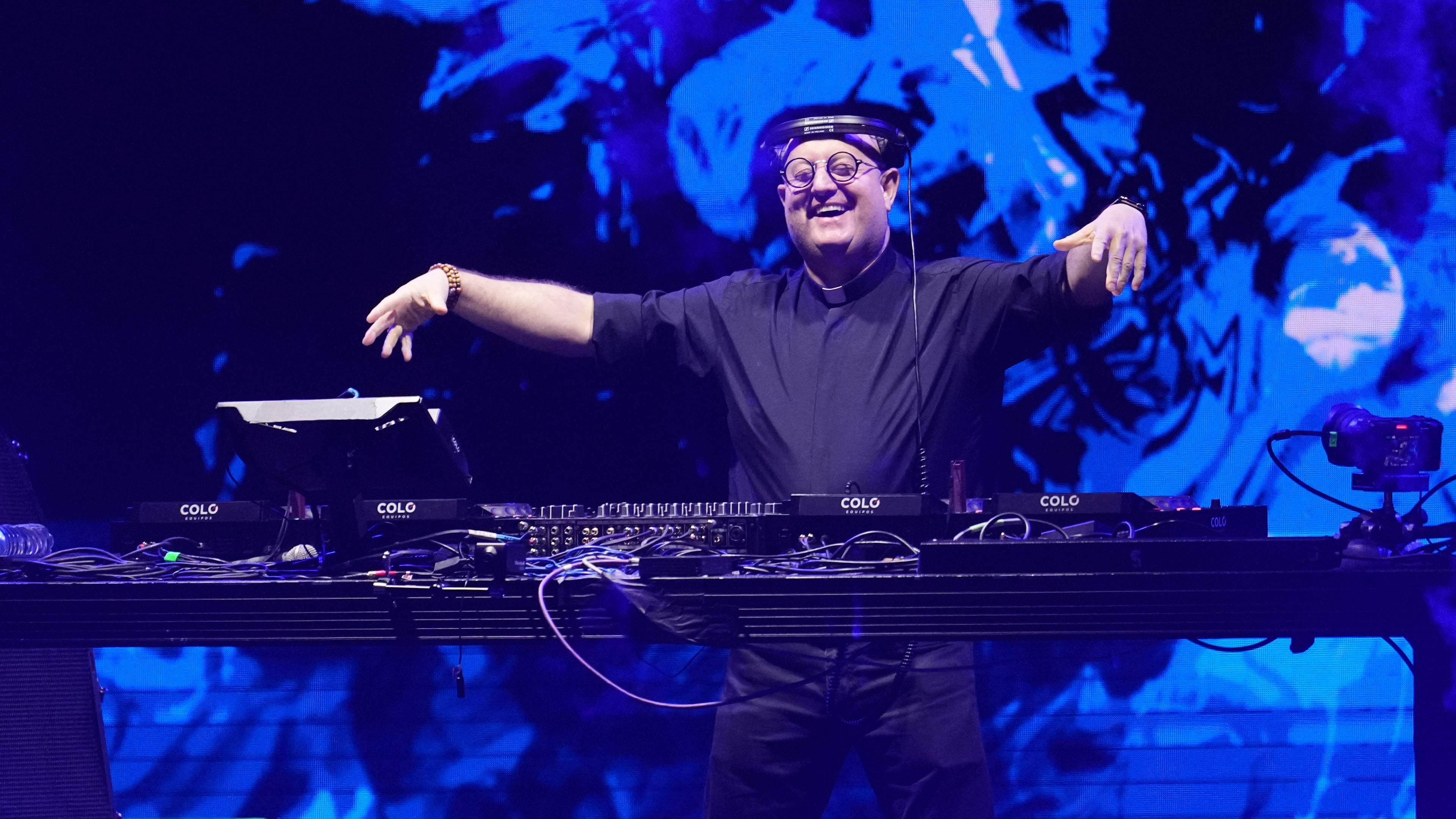 Portuguese Catholic priest, Padre Guilherme performs an open-air DJ set at the Plaza de Mayo, honoring the first year anniversary of Pope Francis' passing in Buenos Aires, Argentina, Saturday, April 18, 2026. (AP Photo/Rodrigo Abd)