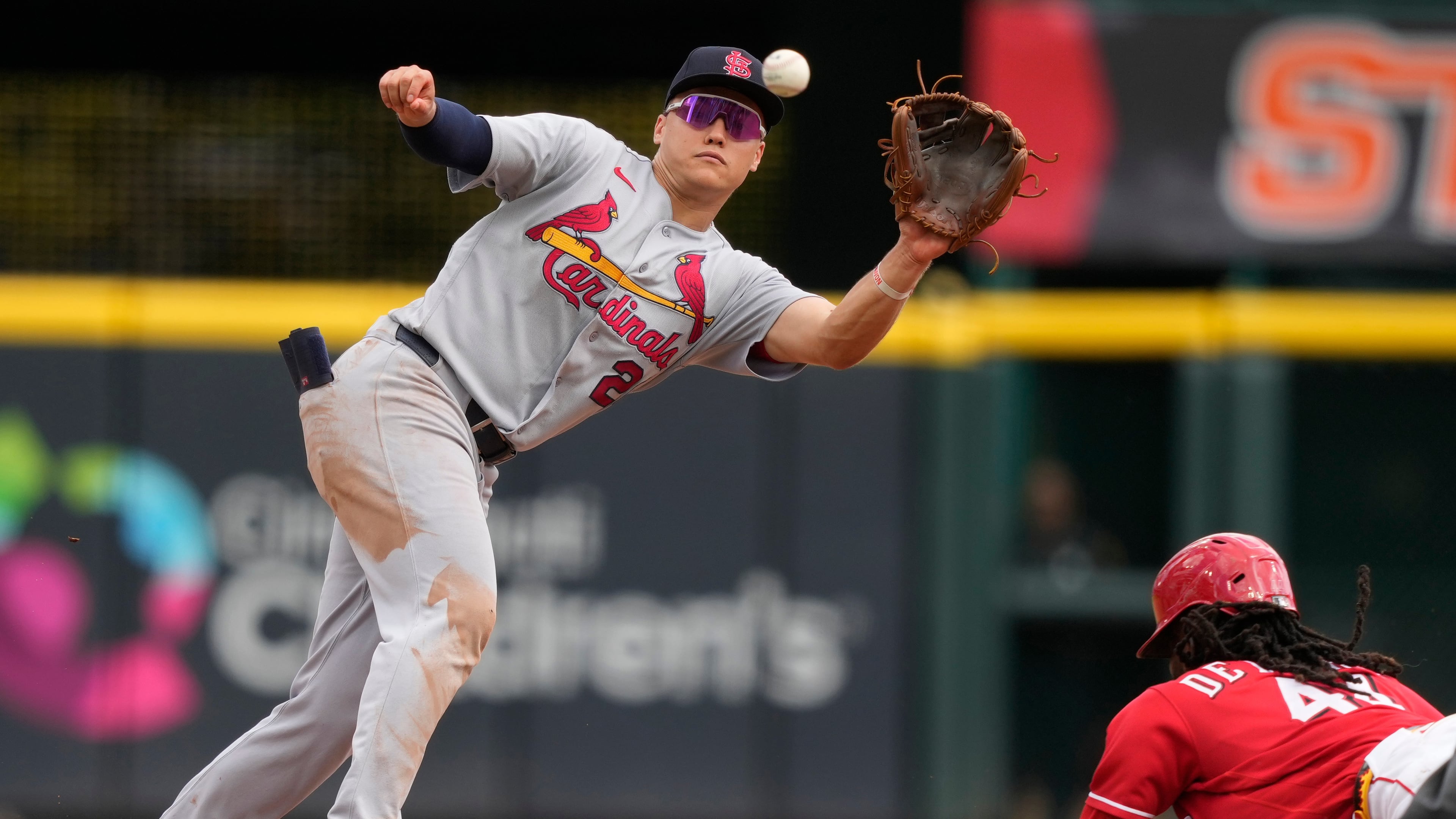 Cincinnati Reds Elly De La Cruz, right, steals second base as St. Louis Cardinals second baseman JJ Wetherholt, left, takes the throw during the eighth inning of a baseball game, Thursday, Aug. 20, 2026, in Cincinnati. (AP Photo/Carolyn Kaster)