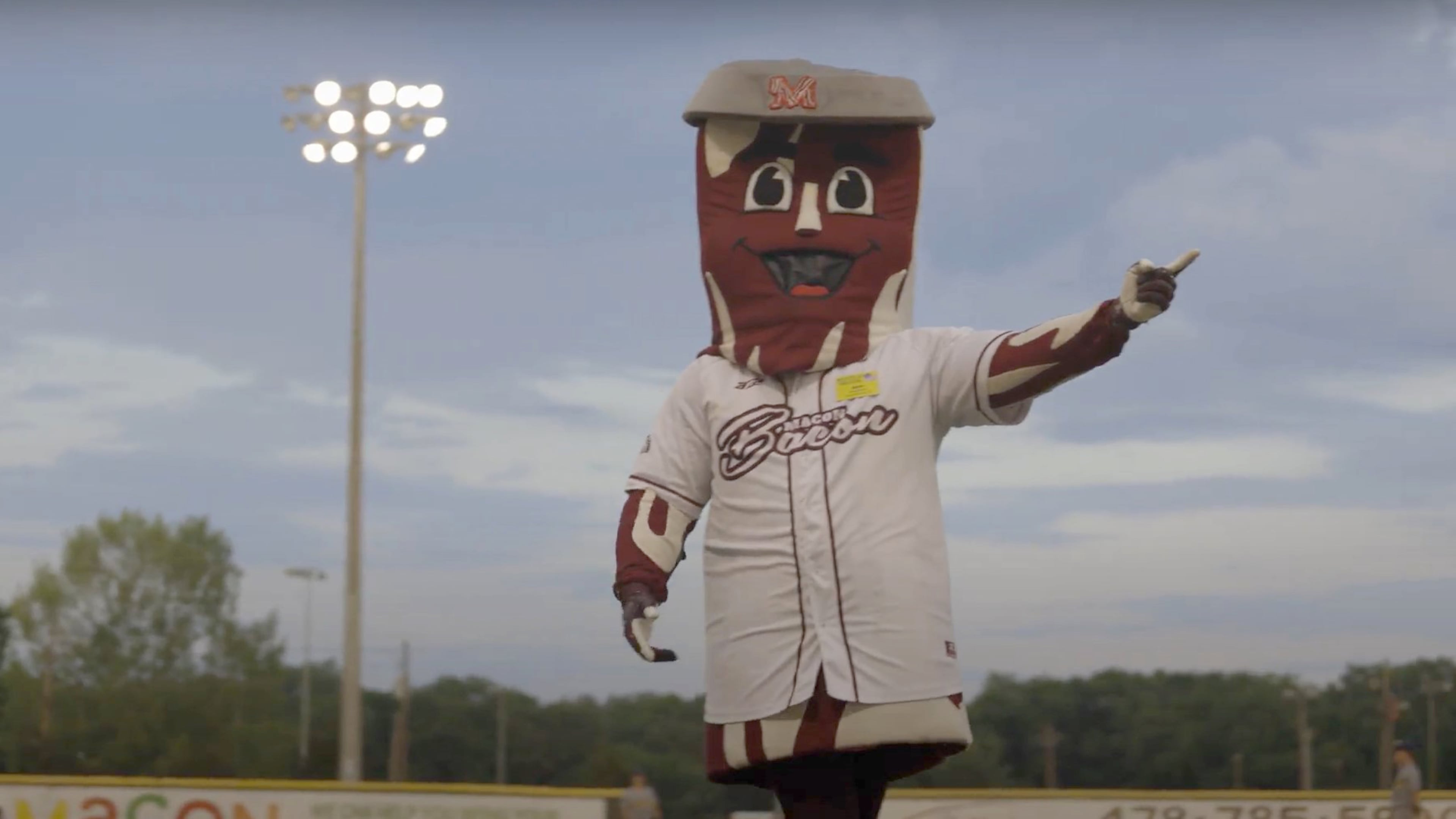 The Macon Bacon, a summer collegiate baseball team in Georgia, is sticking with its mascot despite pushback from a physicians group. MUST CREDIT: Harrison Tarr/Macon Bacon