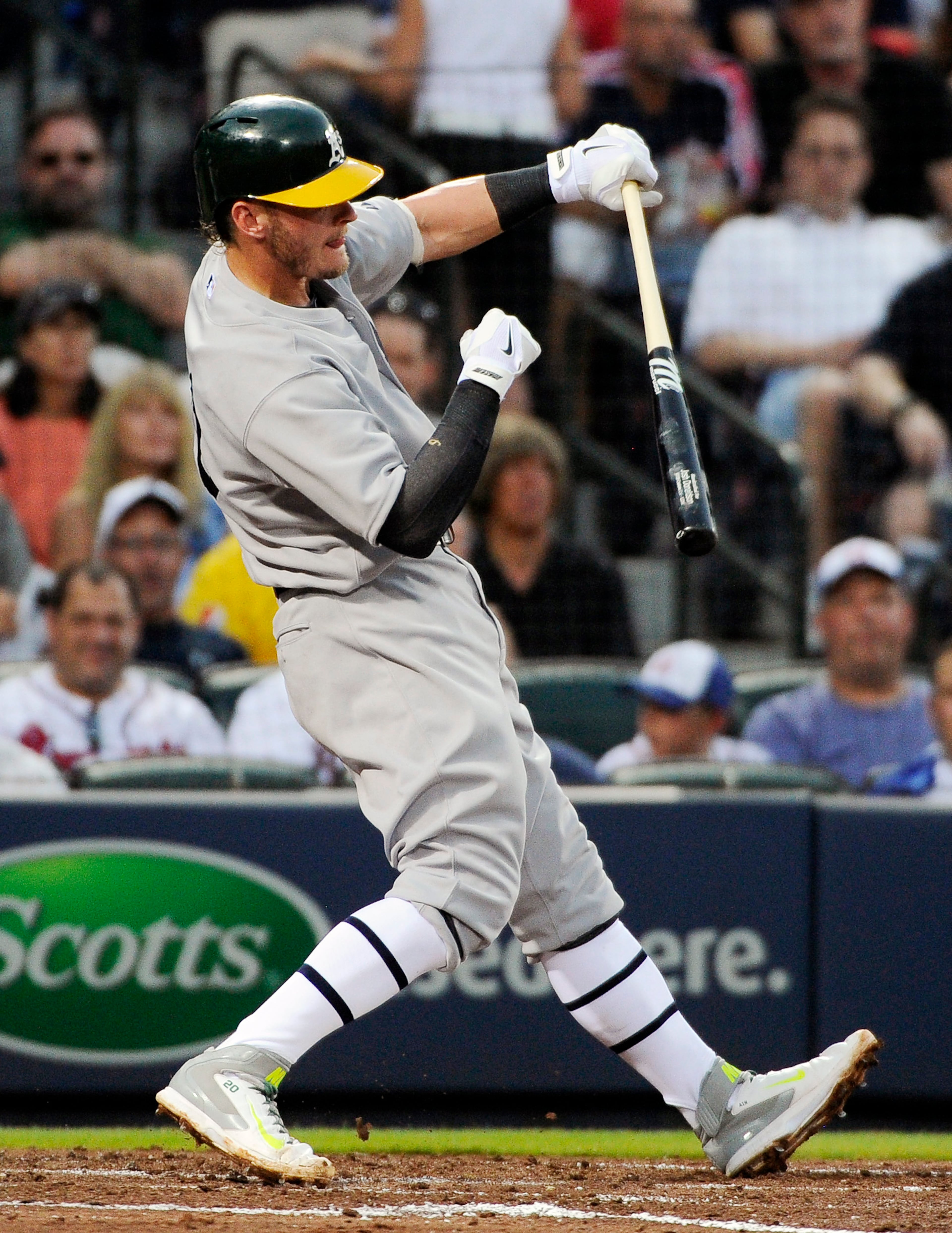 Oakland Athletics' Josh Donaldson strikes out swinging during the fourth inning of a baseball game against the Atlanta Braves Saturday, Aug. 16, 2014, in Atlanta. (AP Photo/David Tulis)