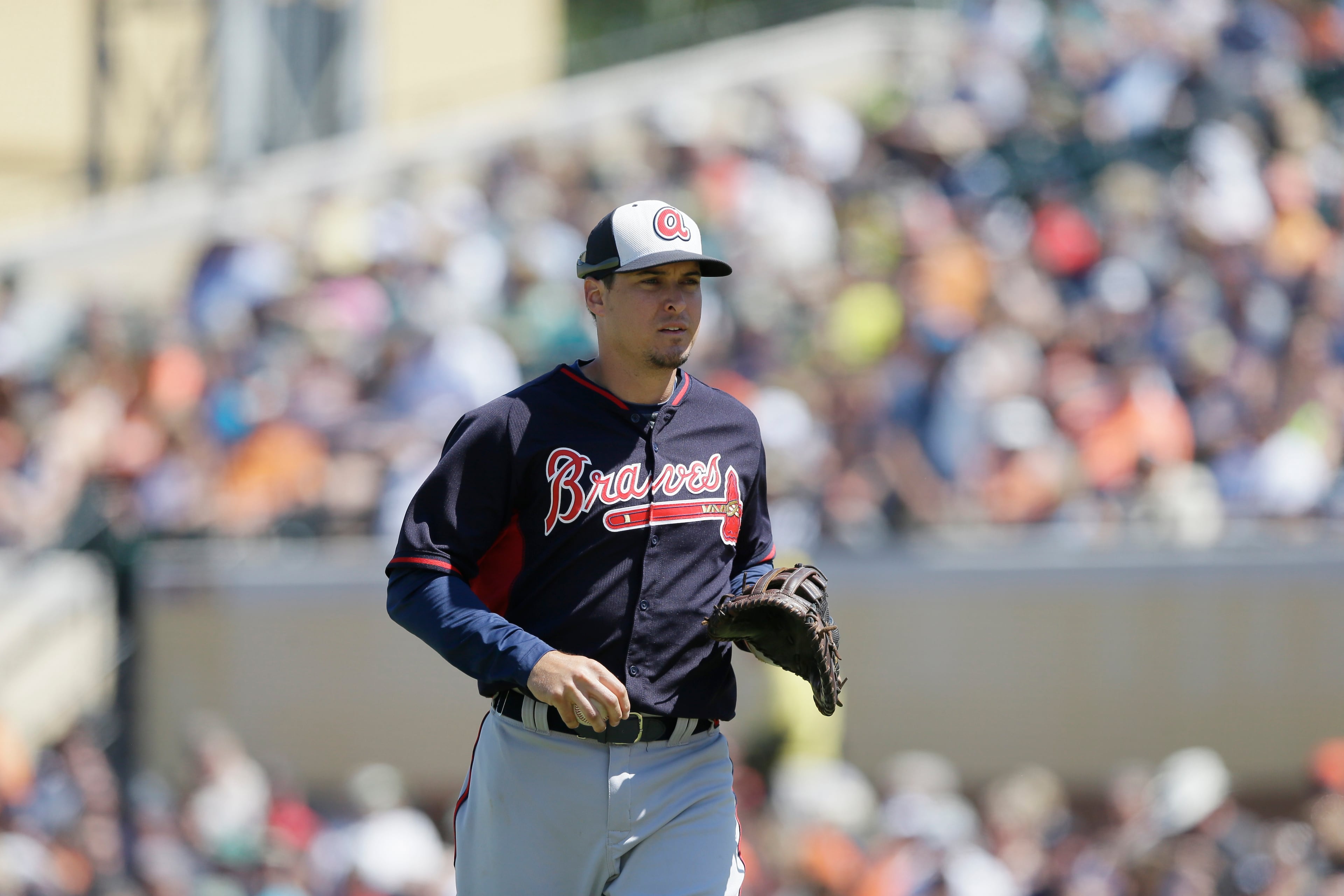 Atlanta Braves first baseman Kelly Johnson runs to the dugout during the sixth inning of a spring training exhibition baseball game against the Detroit Tigers in Lakeland, Fla., Monday, March 30, 2015. (AP Photo/Carlos Osorio)