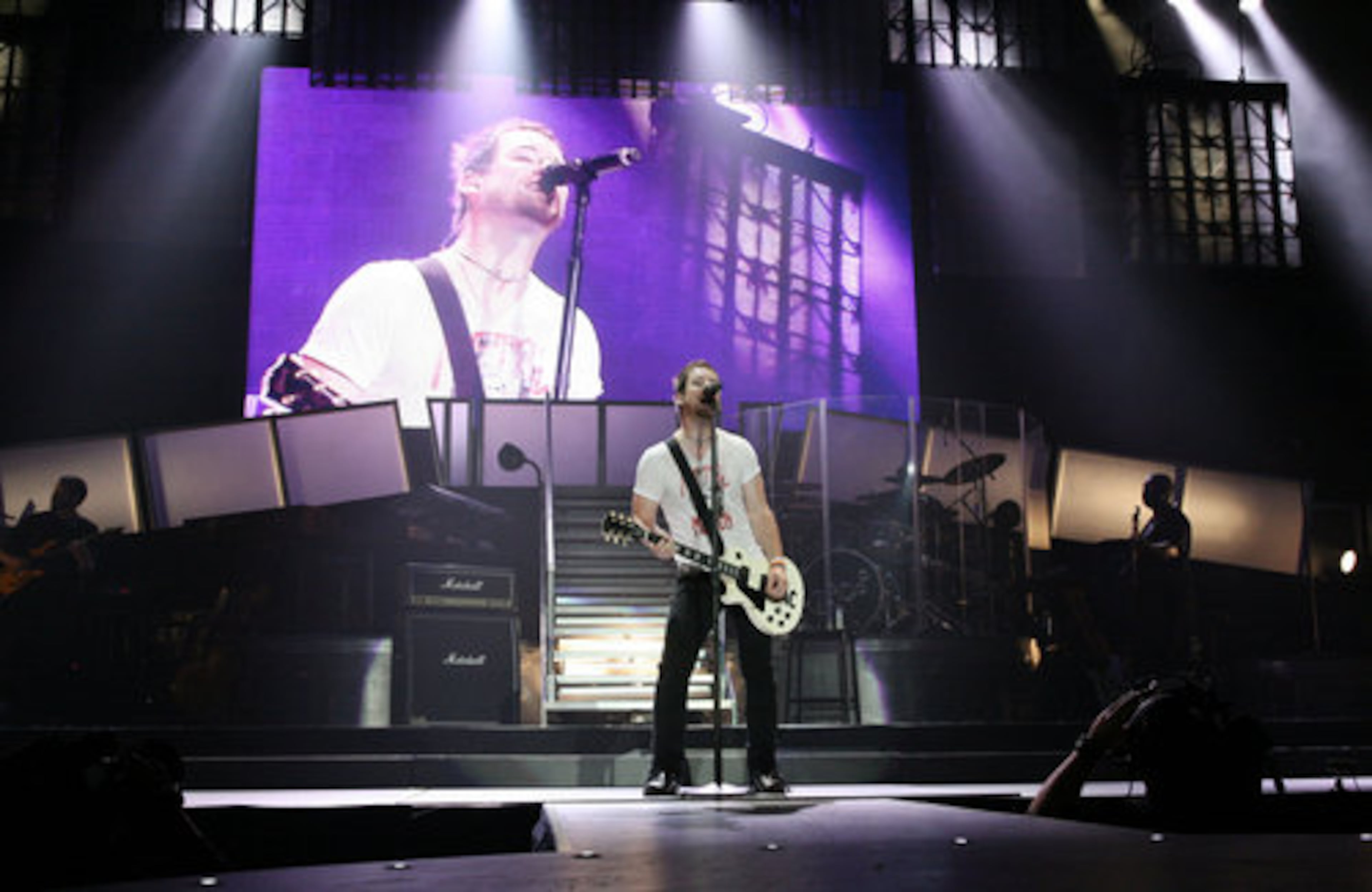 David Cook strums away at his guitar.