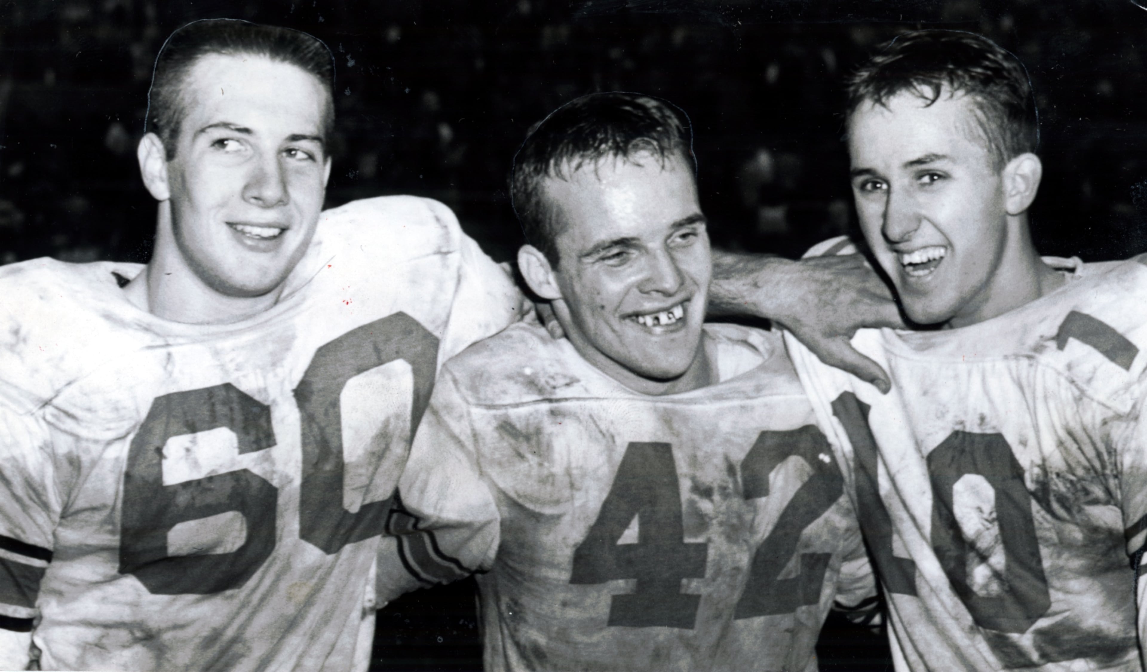 College and pro football hall of fame member Fran Tarkenton is making a six-figure donation to the Georgia Athletic Association’s campaign to raise funds to build an indoor football facility. Take a look at photos from Tarkenton's football (and basketball) career. In this photo, Georgia's Fran Tarkenton (right), Pat Dye (left) and Bill Godfrey celebrate a big victory. (Bill Young/AJC staff)