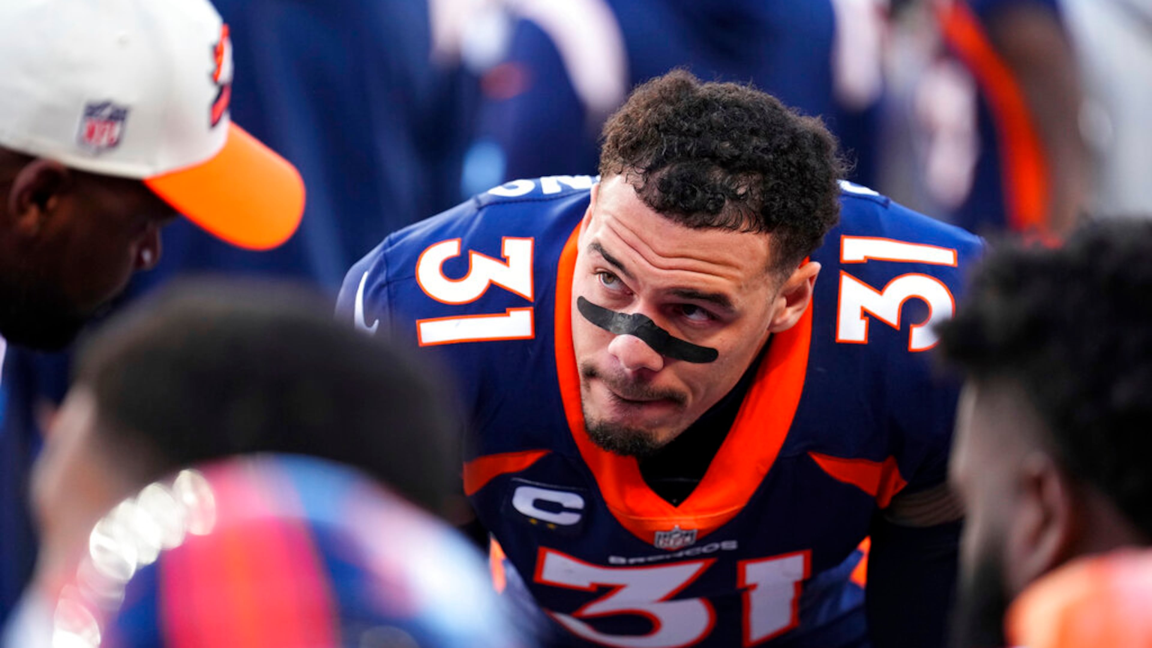 Denver Broncos safety Justin Simmons (31) looks on against the Kansas City Chiefs during the first half of an NFL football game, Sunday, Dec. 11, 2022, in Denver. (AP Photo/Jack Dempsey)